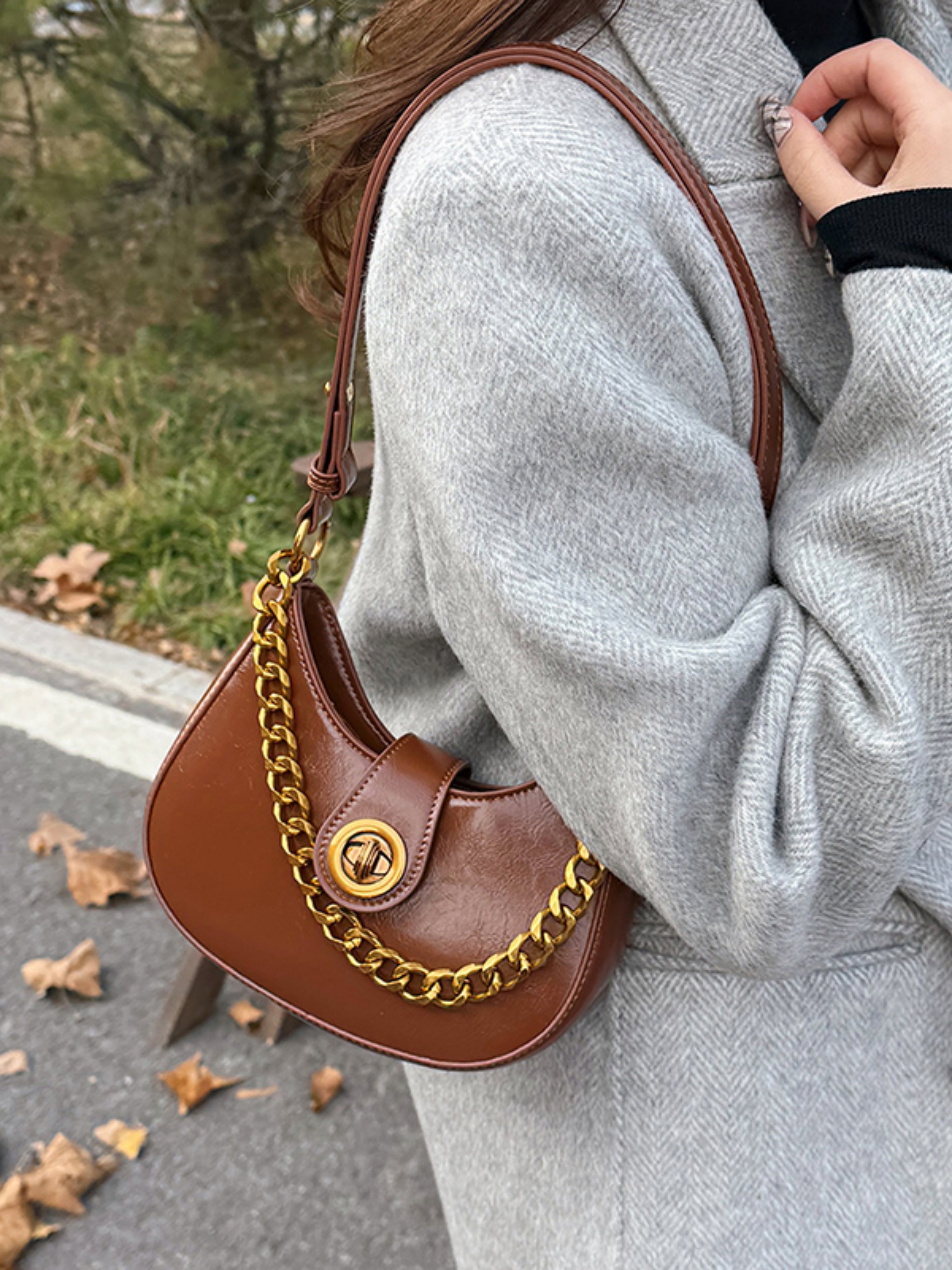 Brown Crescent Handbag with Gold Chain Detail