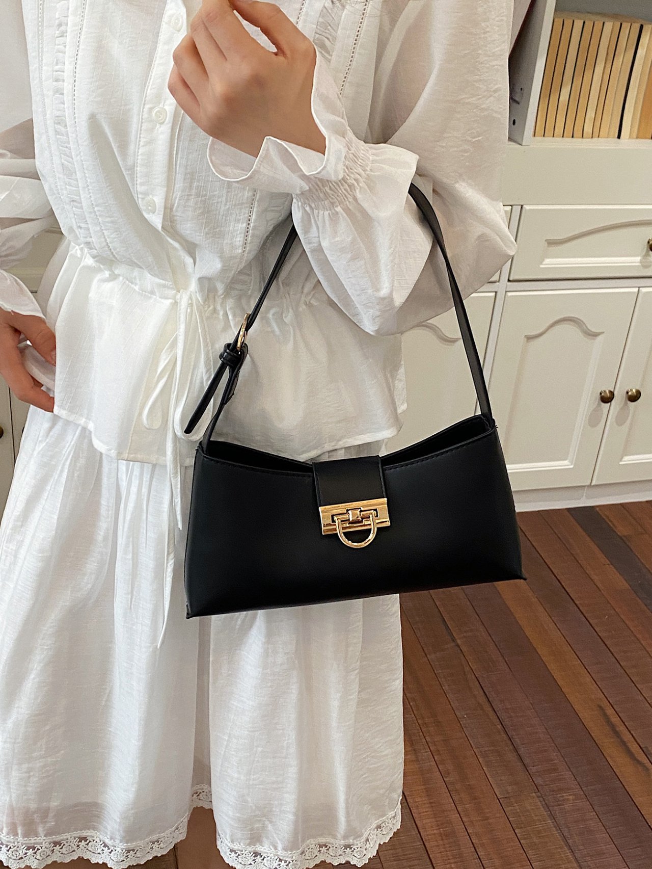 Black Shoulder Bag with Gold Clasp