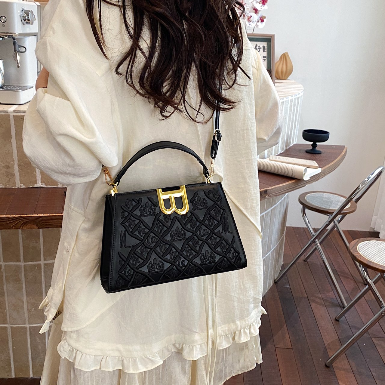Black Crossbody Bag with Embossed Design
