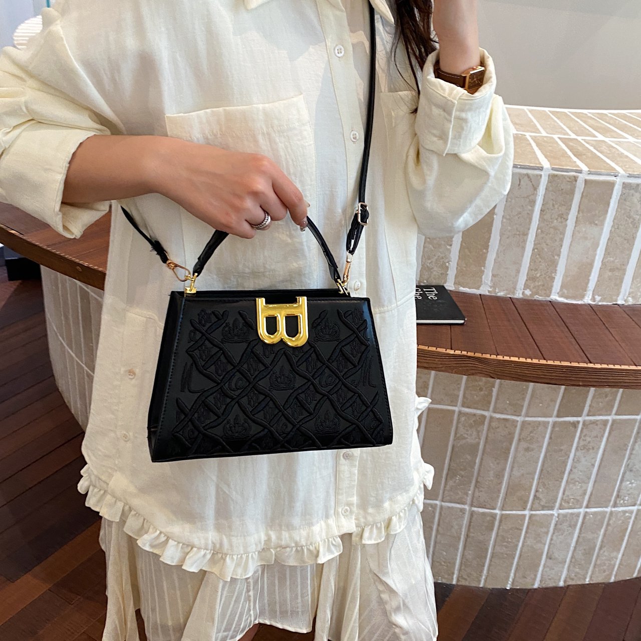 Black Crossbody Bag with Embossed Design