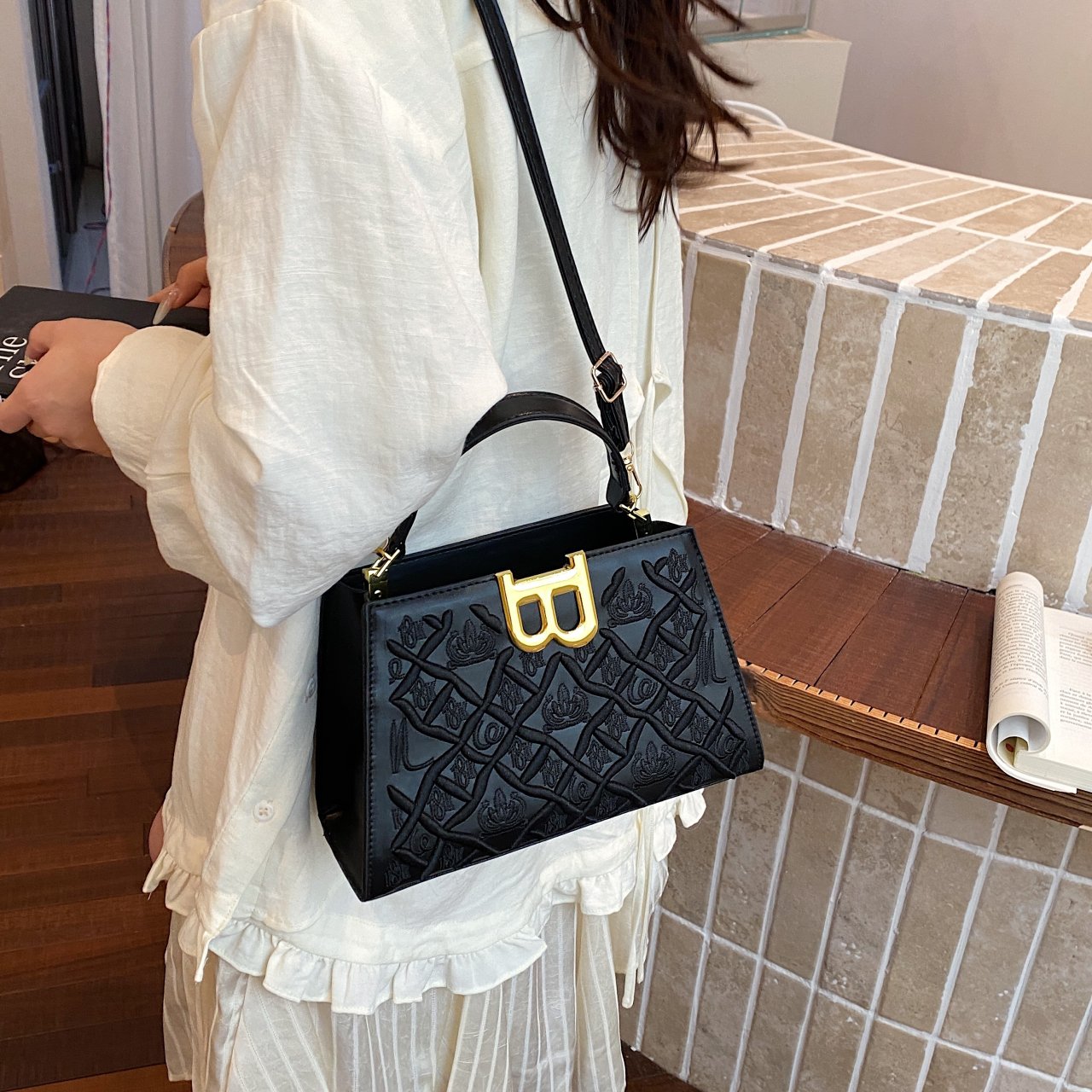 Black Crossbody Bag with Embossed Design