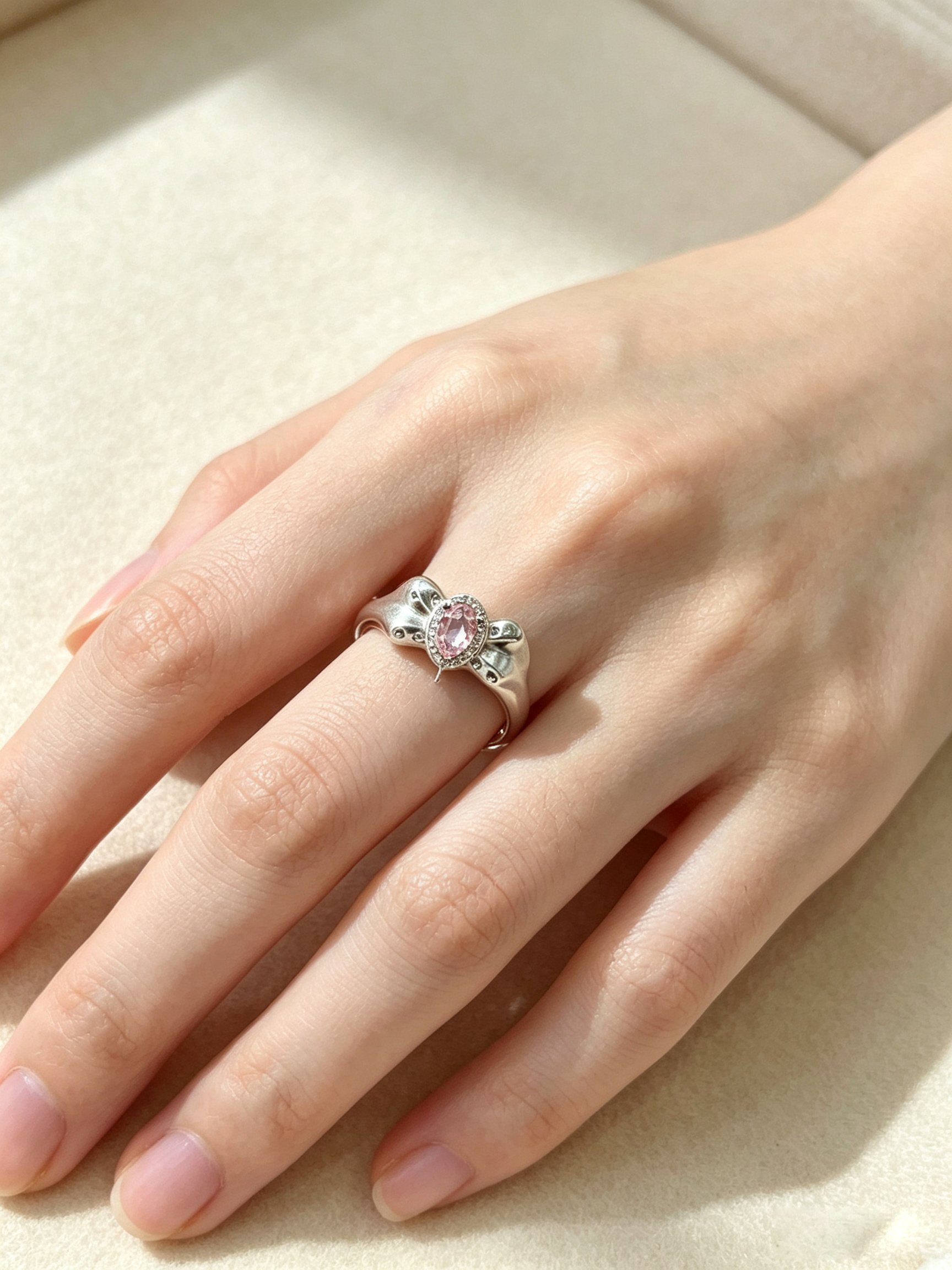 Silver Bow Ring with Pink Zircon