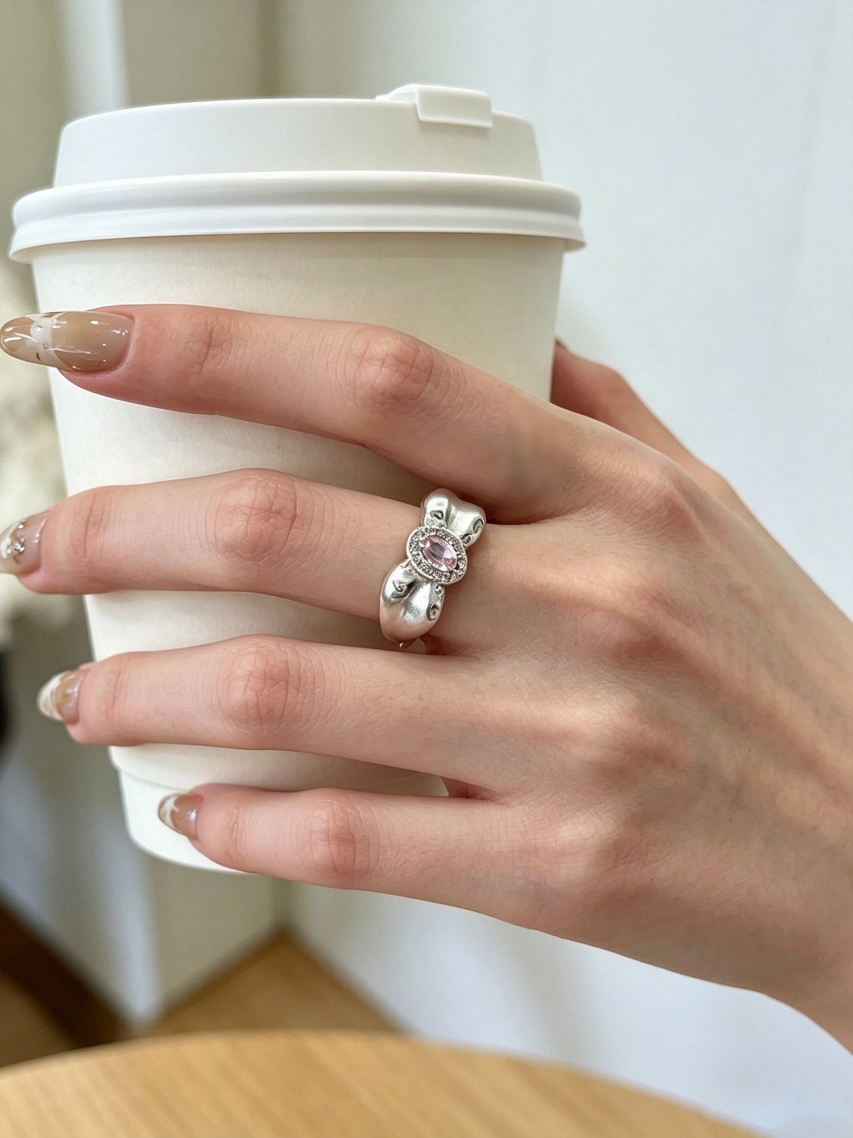 Silver Bow Ring with Pink Zircon