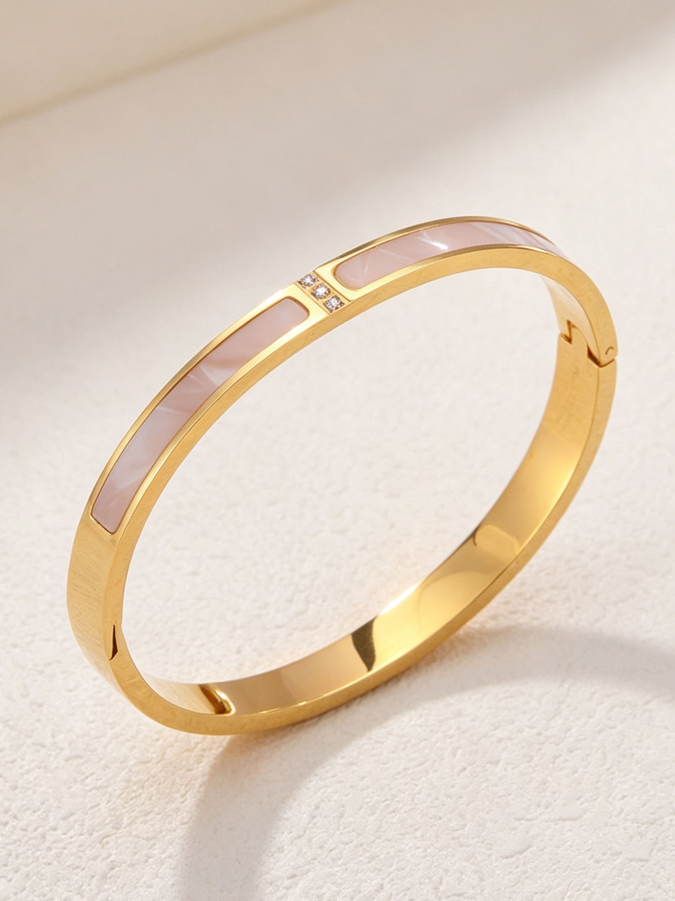 Gold and Pink Mother-of-Pearl Bangle with Zirconia Accents