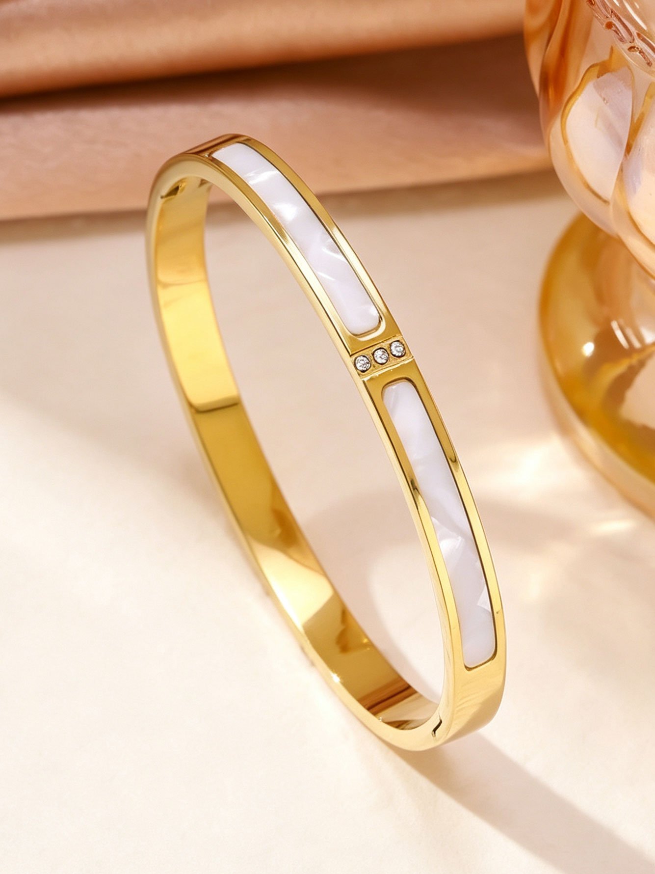 Gold and Pink Mother-of-Pearl Bangle with Zirconia Accents