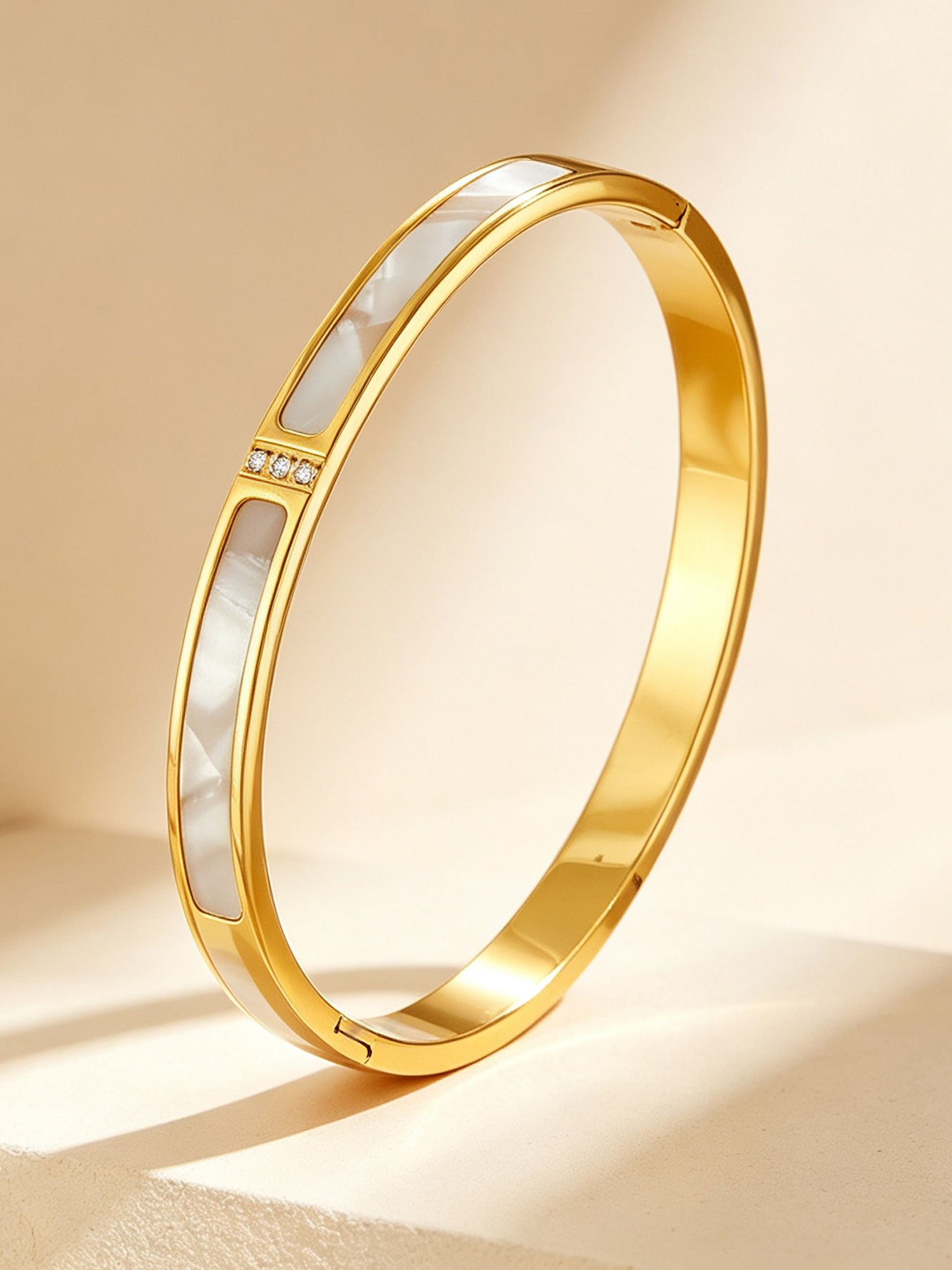 Gold and Pink Mother-of-Pearl Bangle with Zirconia Accents