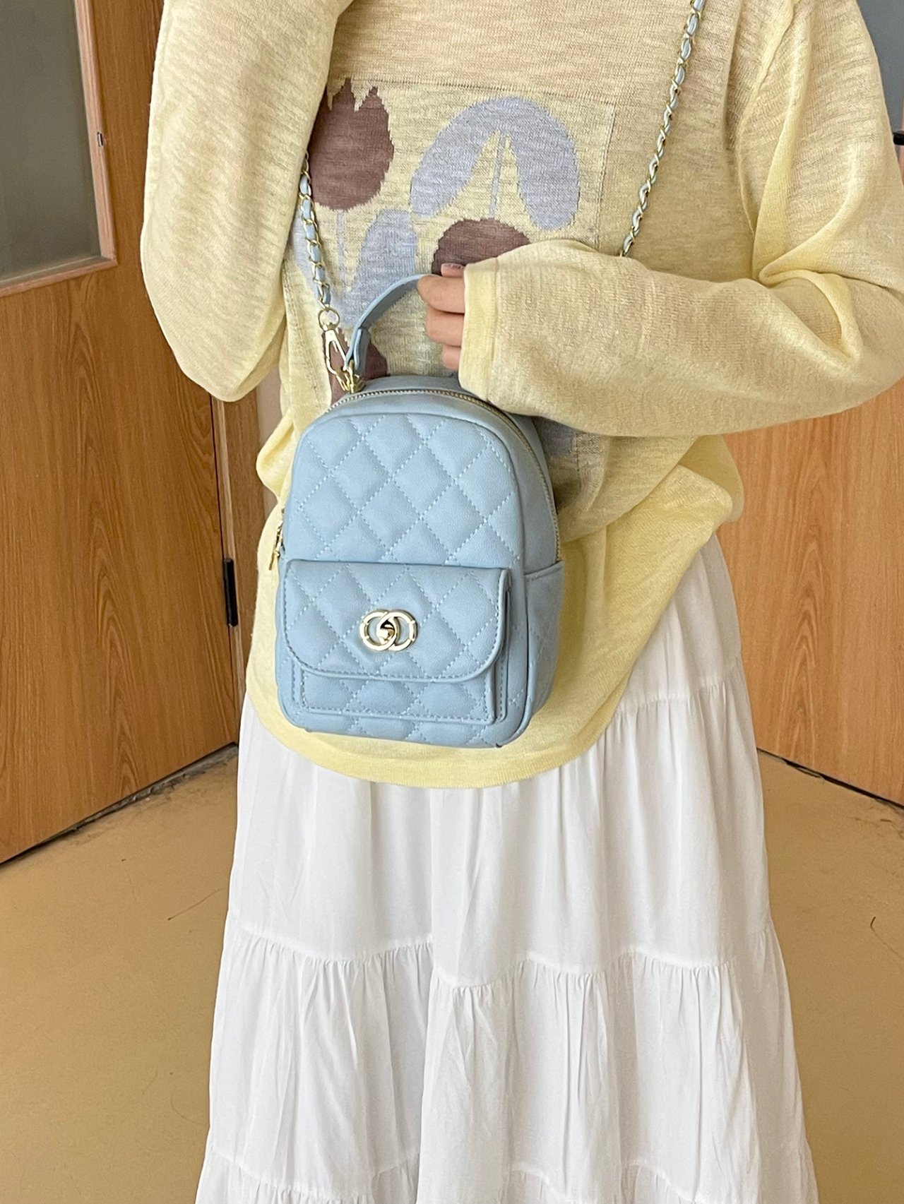 حقيبة كروس بودي مبطنة باللون الأزرق