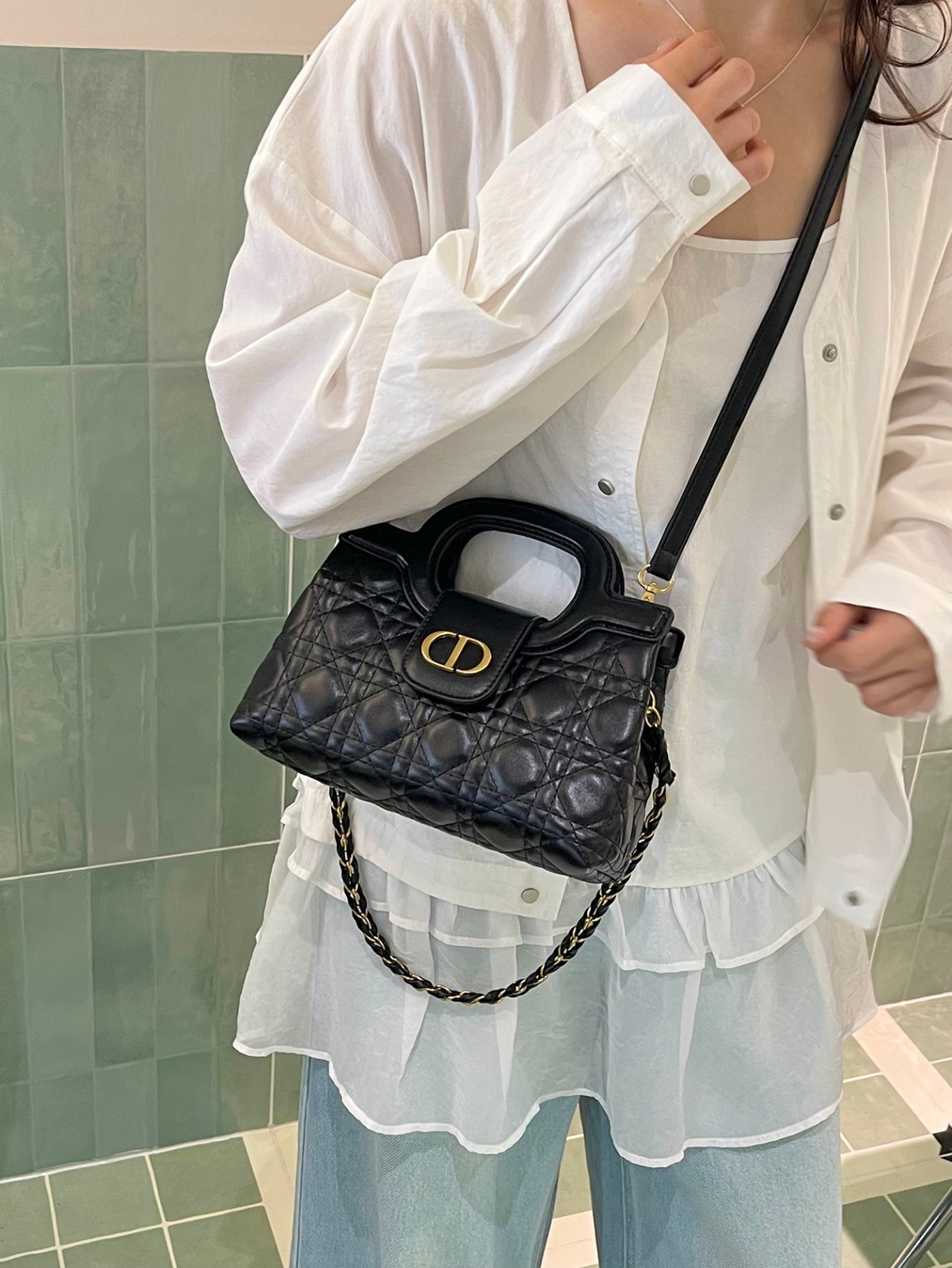 Black Quilted Crossbody Bag with Gold Accent