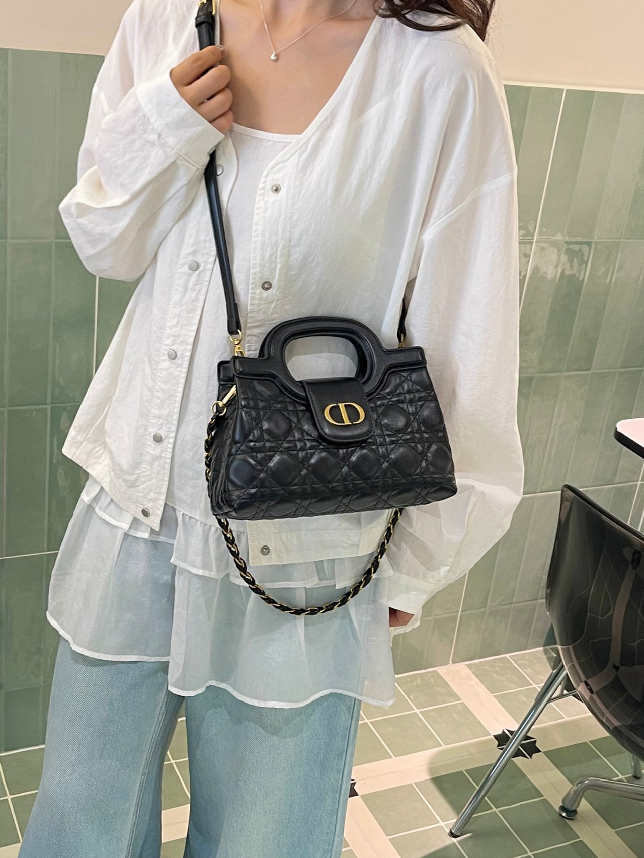 Black Quilted Crossbody Bag with Gold Accent