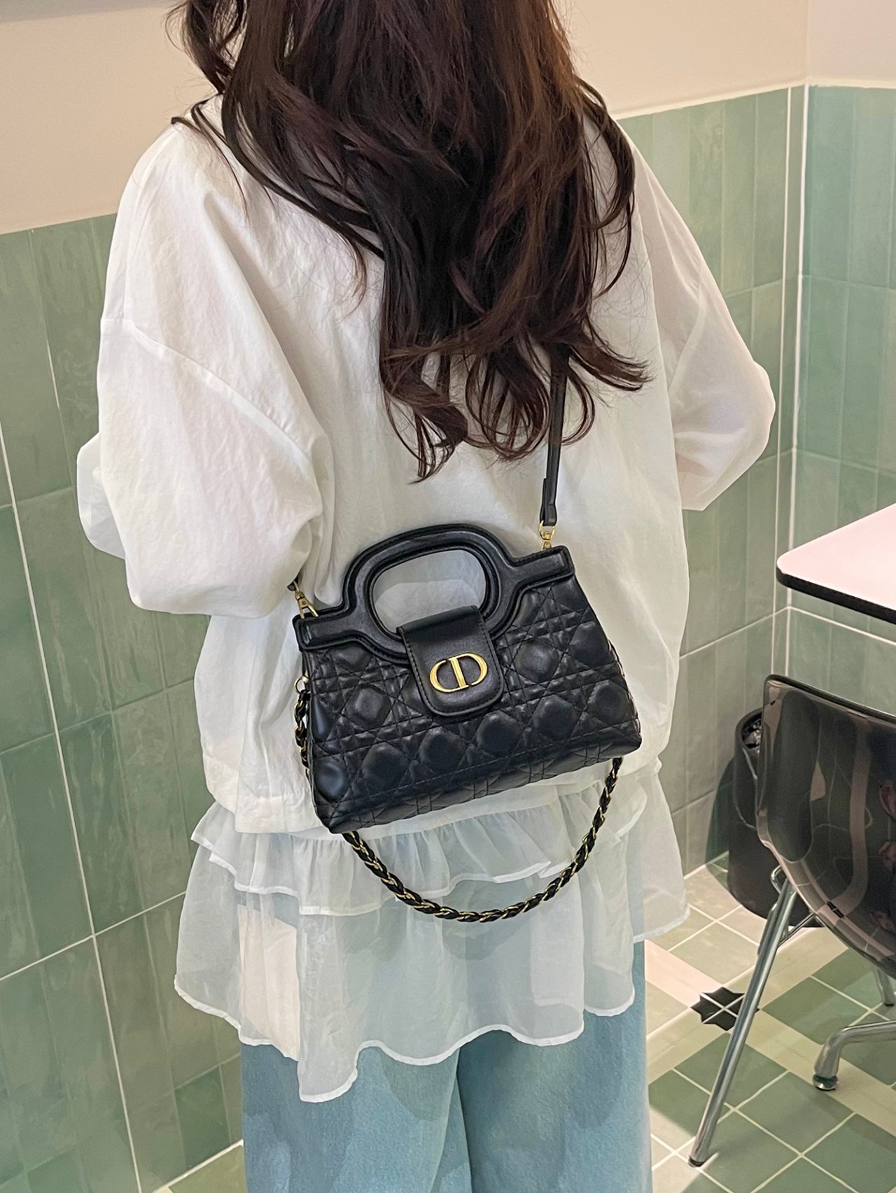 Black Quilted Crossbody Bag with Gold Accent