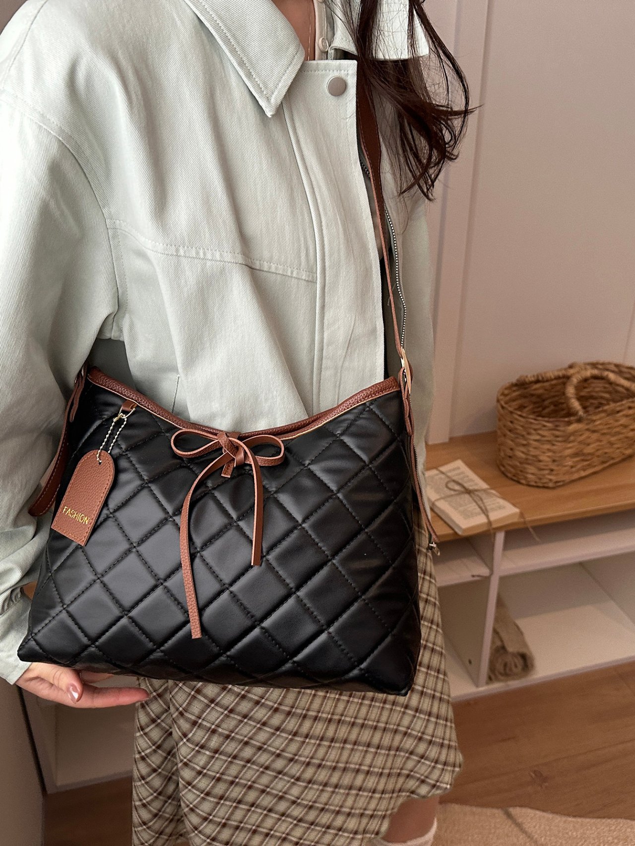Black Quilted Crossbody Bag with Pendant