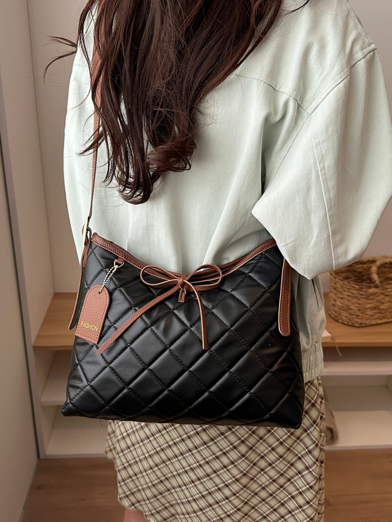 Black Quilted Crossbody Bag with Pendant
