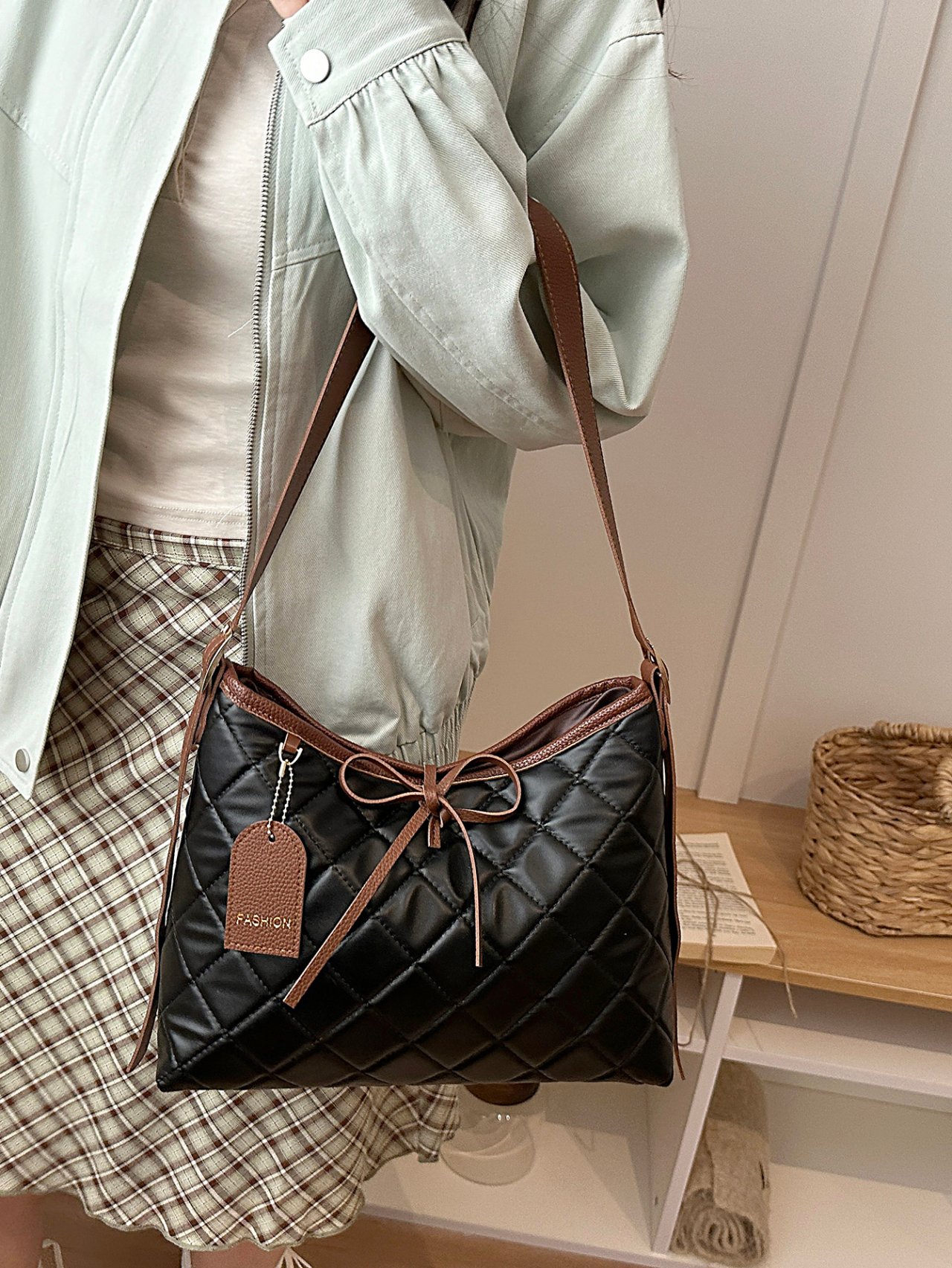 Black Quilted Crossbody Bag with Pendant