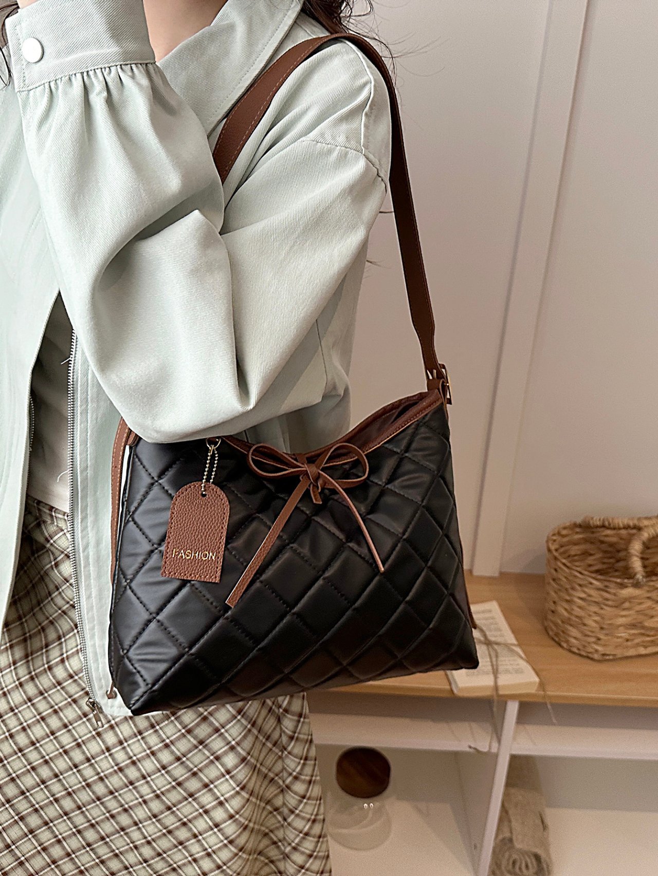 Black Quilted Crossbody Bag with Pendant
