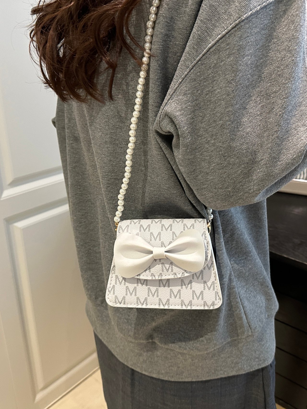 White Mini Crossbody Bag with Pearl Strap and Bow Detail