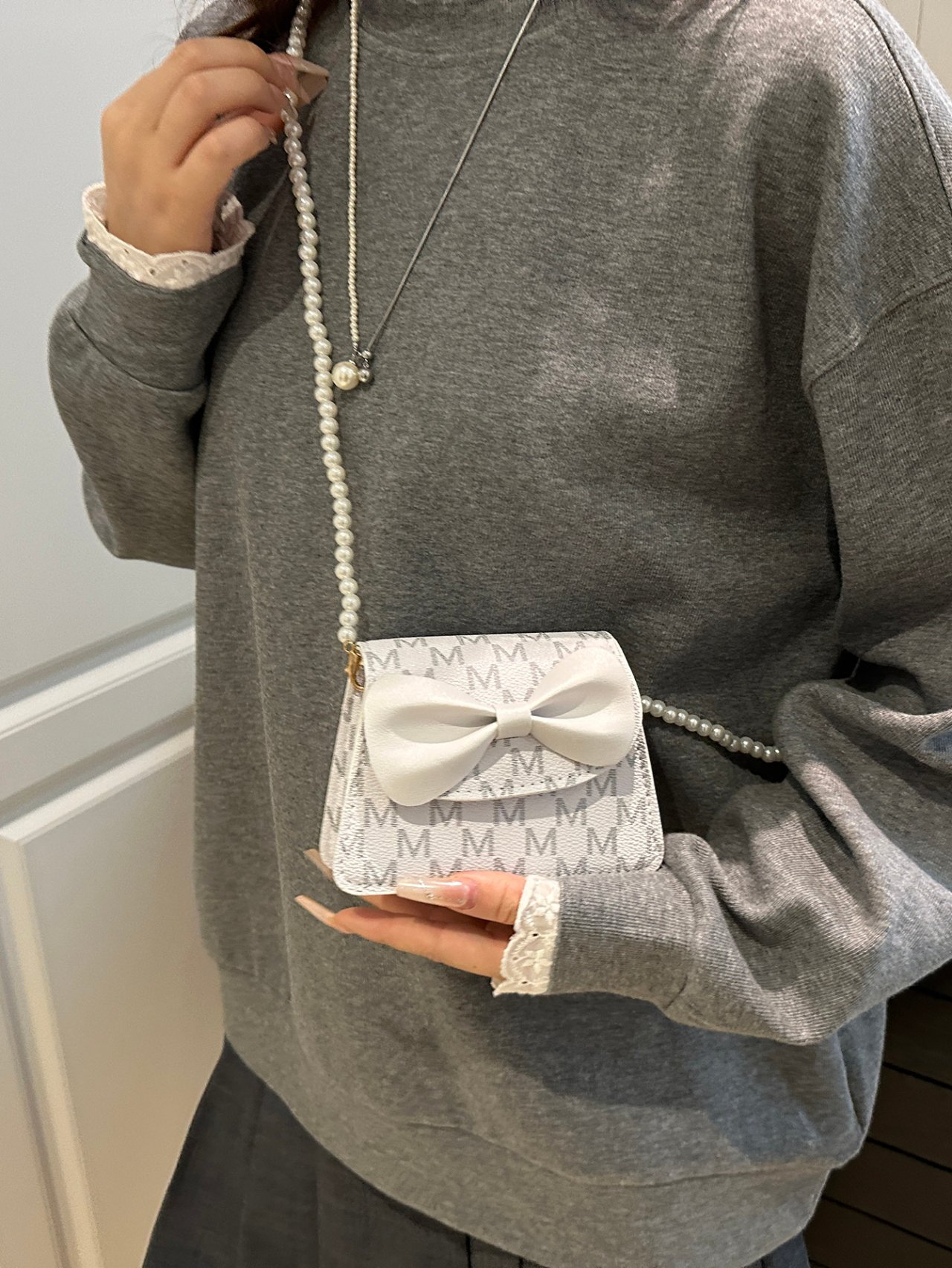 White Mini Crossbody Bag with Pearl Strap and Bow Detail