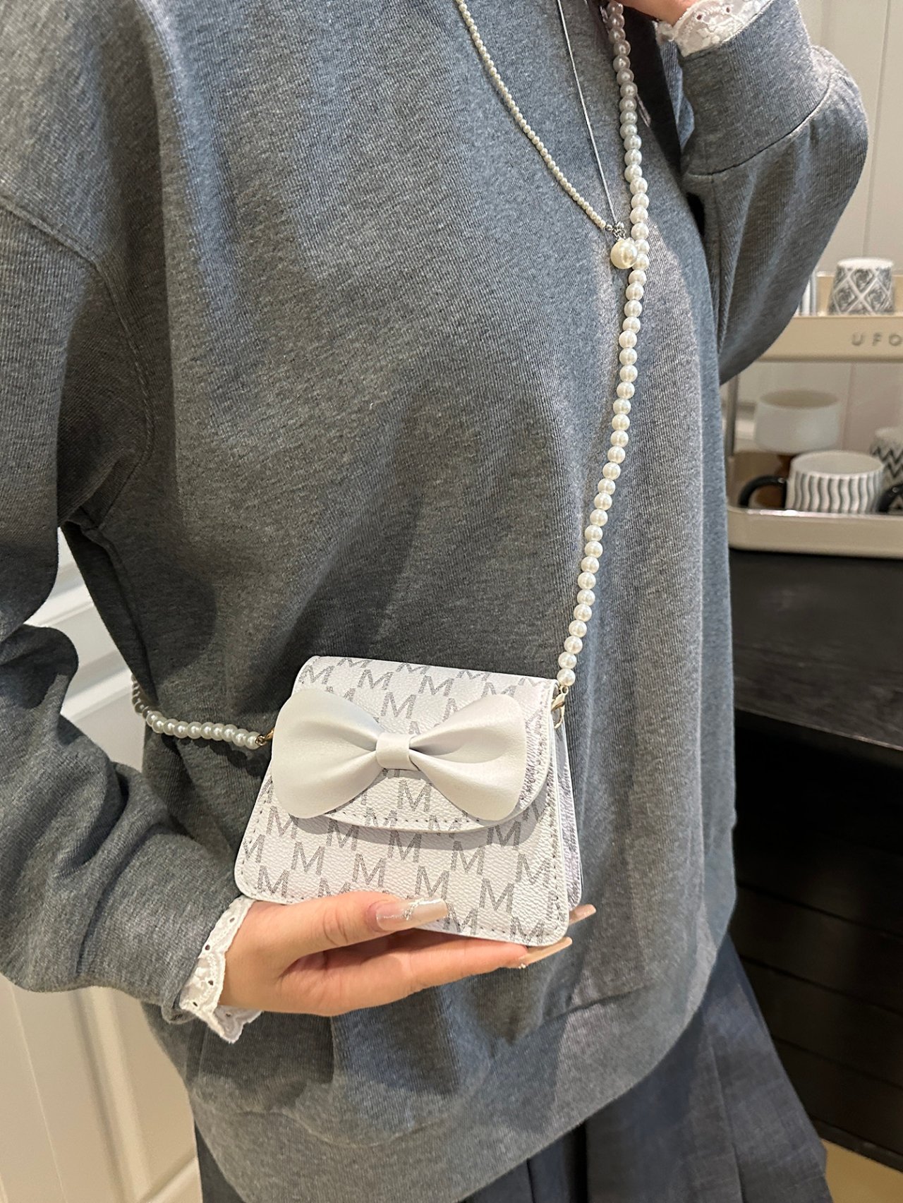 White Mini Crossbody Bag with Pearl Strap and Bow Detail