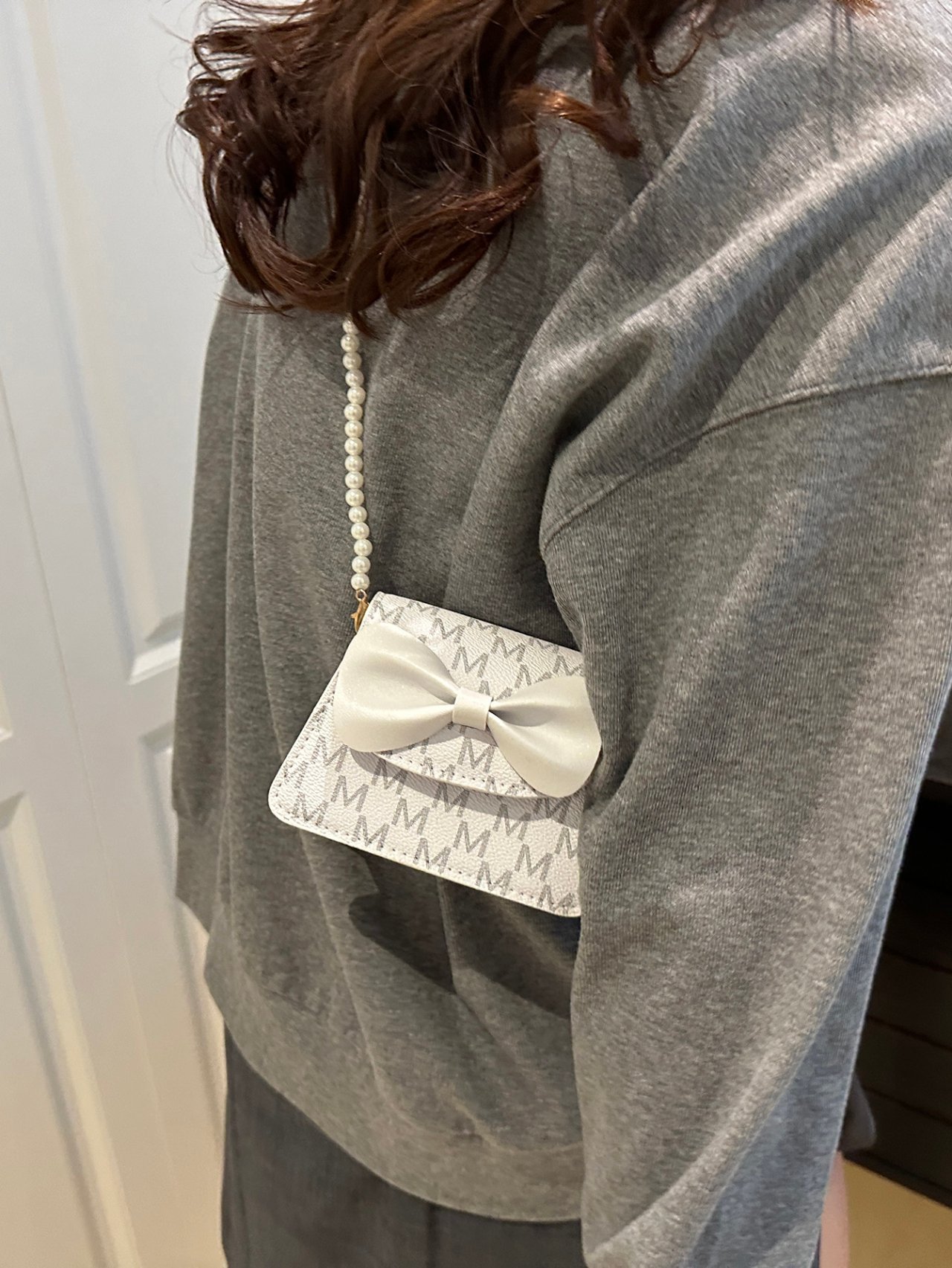 White Mini Crossbody Bag with Pearl Strap and Bow Detail