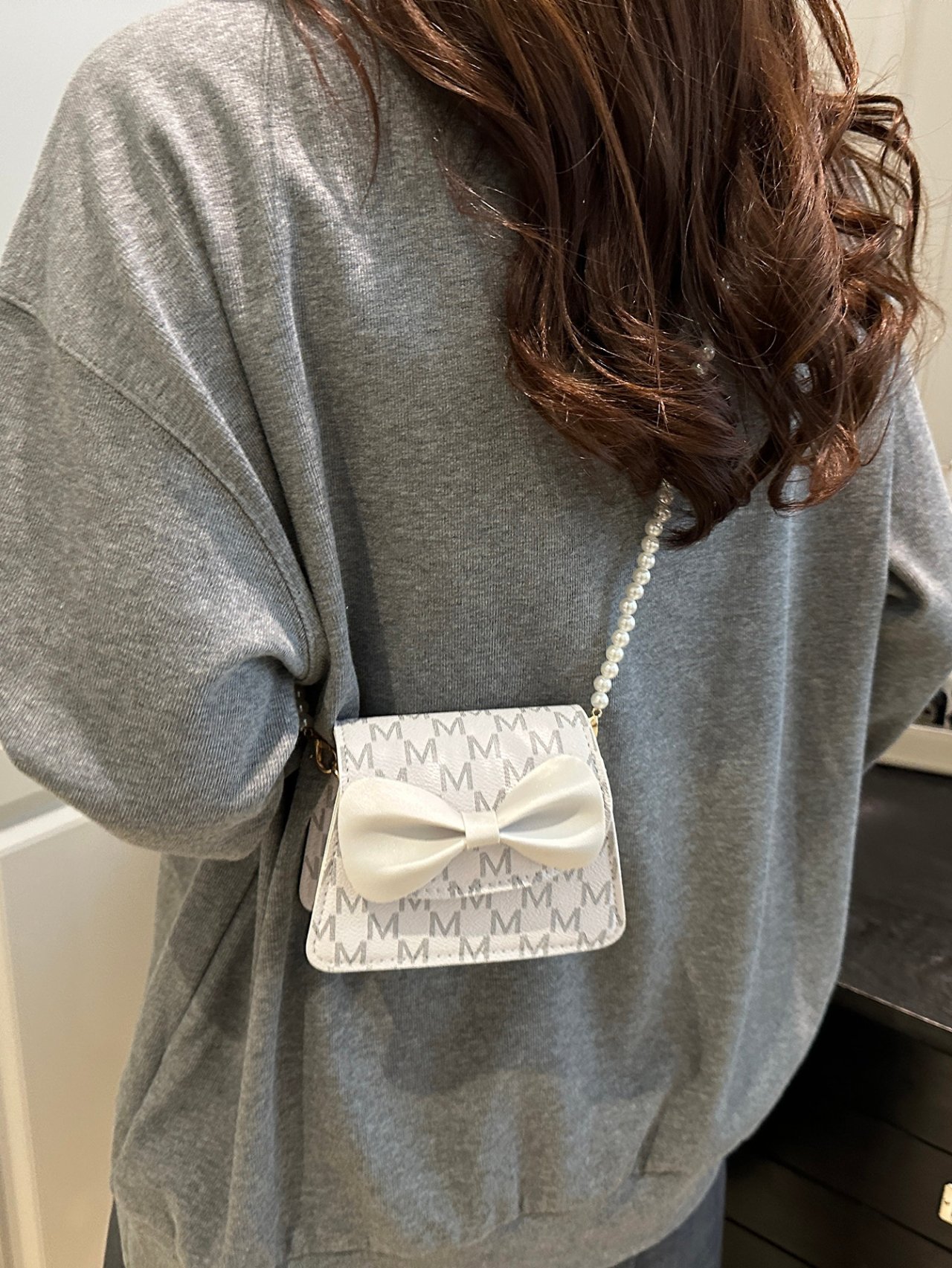 White Mini Crossbody Bag with Pearl Strap and Bow Detail