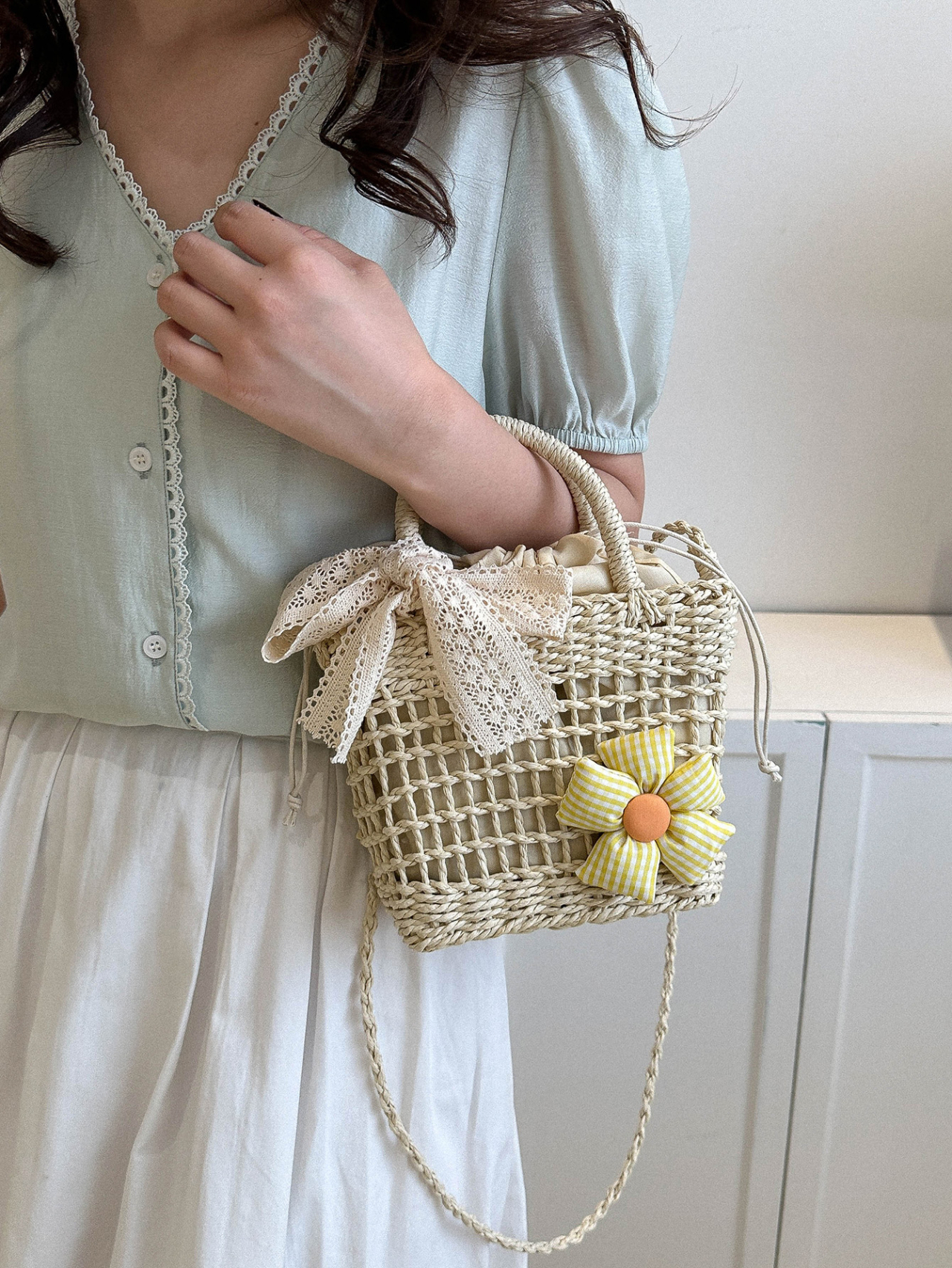 Beige Woven Straw Crossbody Bag with Floral Accent