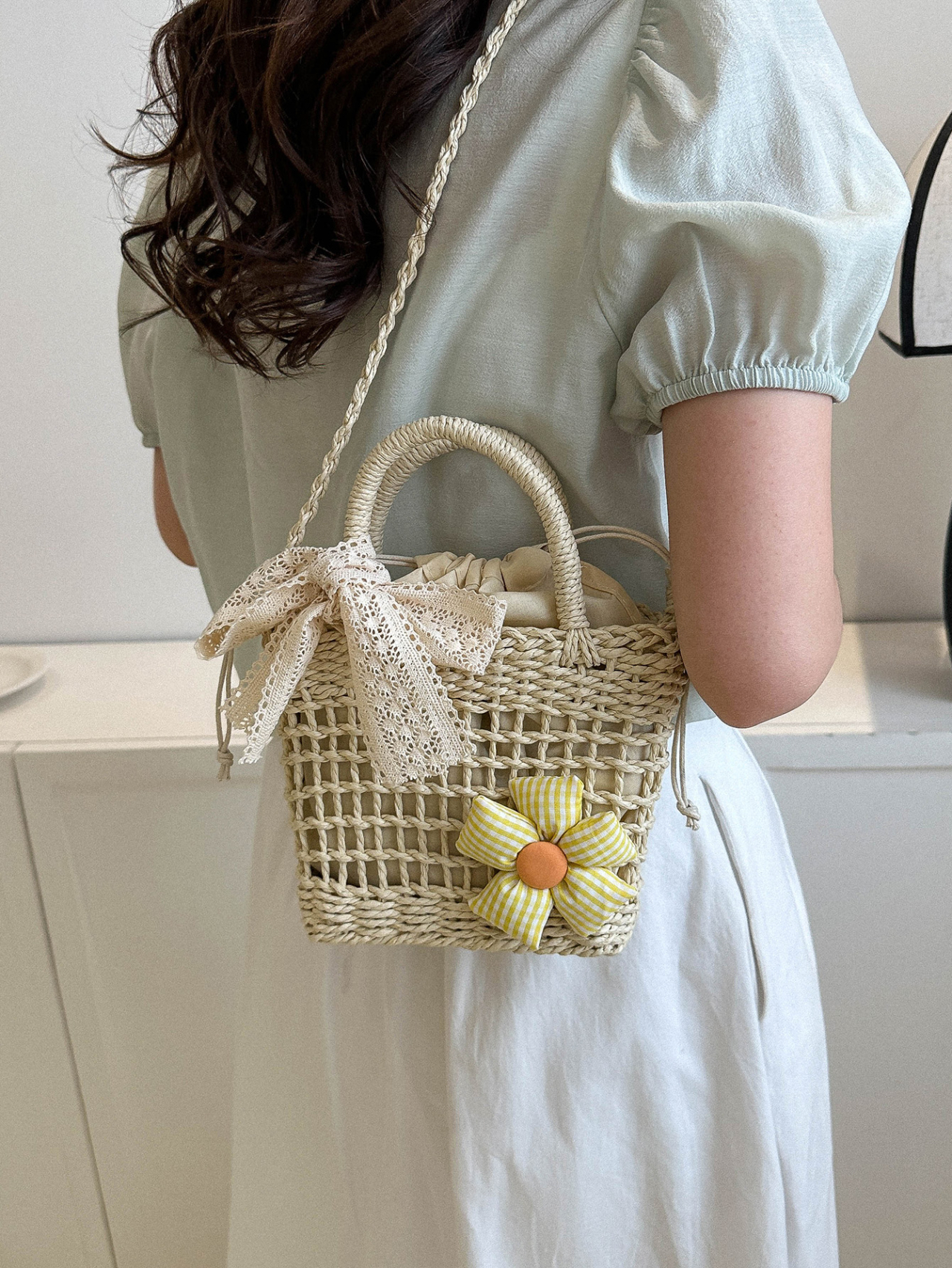 Beige Woven Straw Crossbody Bag with Floral Accent