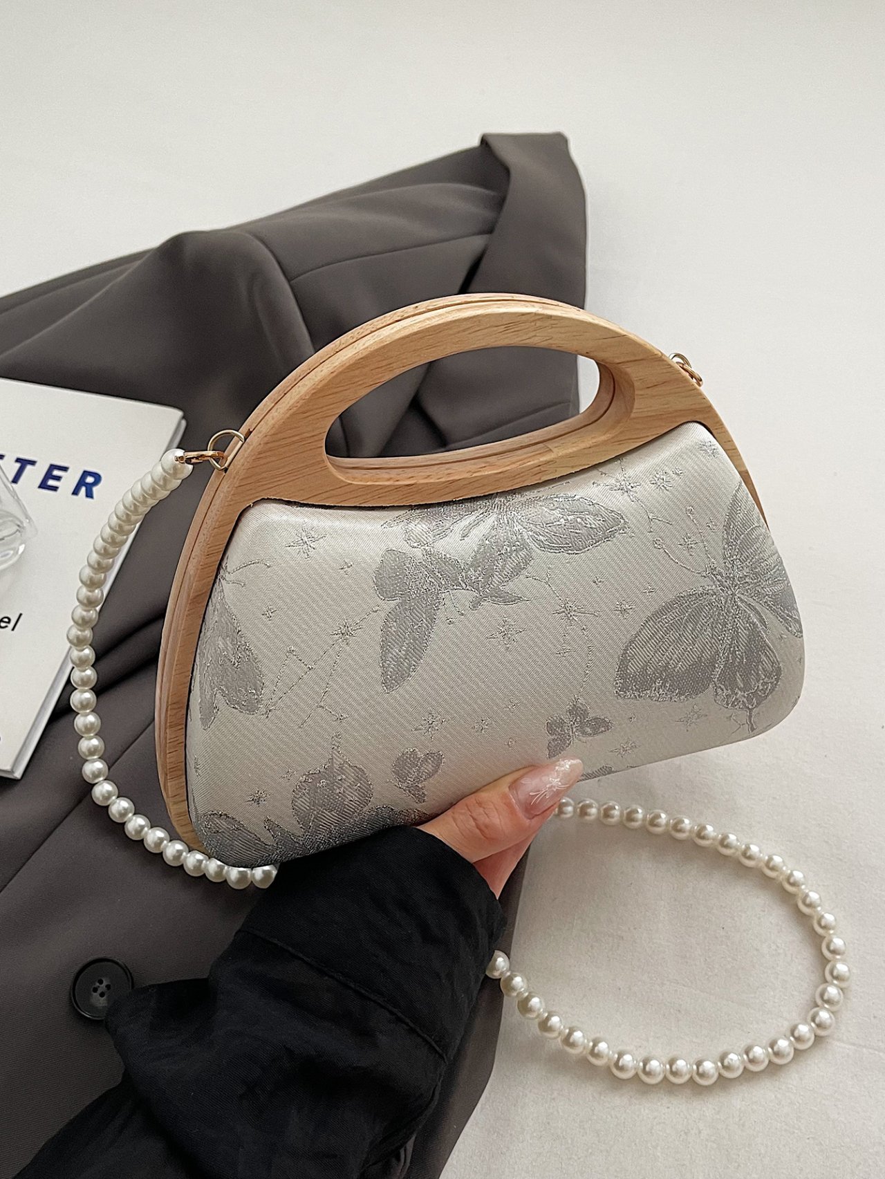 Off-White Butterfly Clutch with Pearl Strap