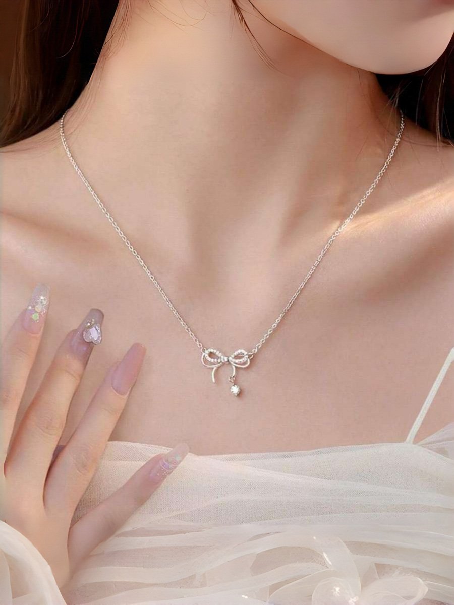 Delicate high carbon diamond bow tie necklace for women, versatile, light luxury, small niche pendant, butterfly dream collar chain, gift