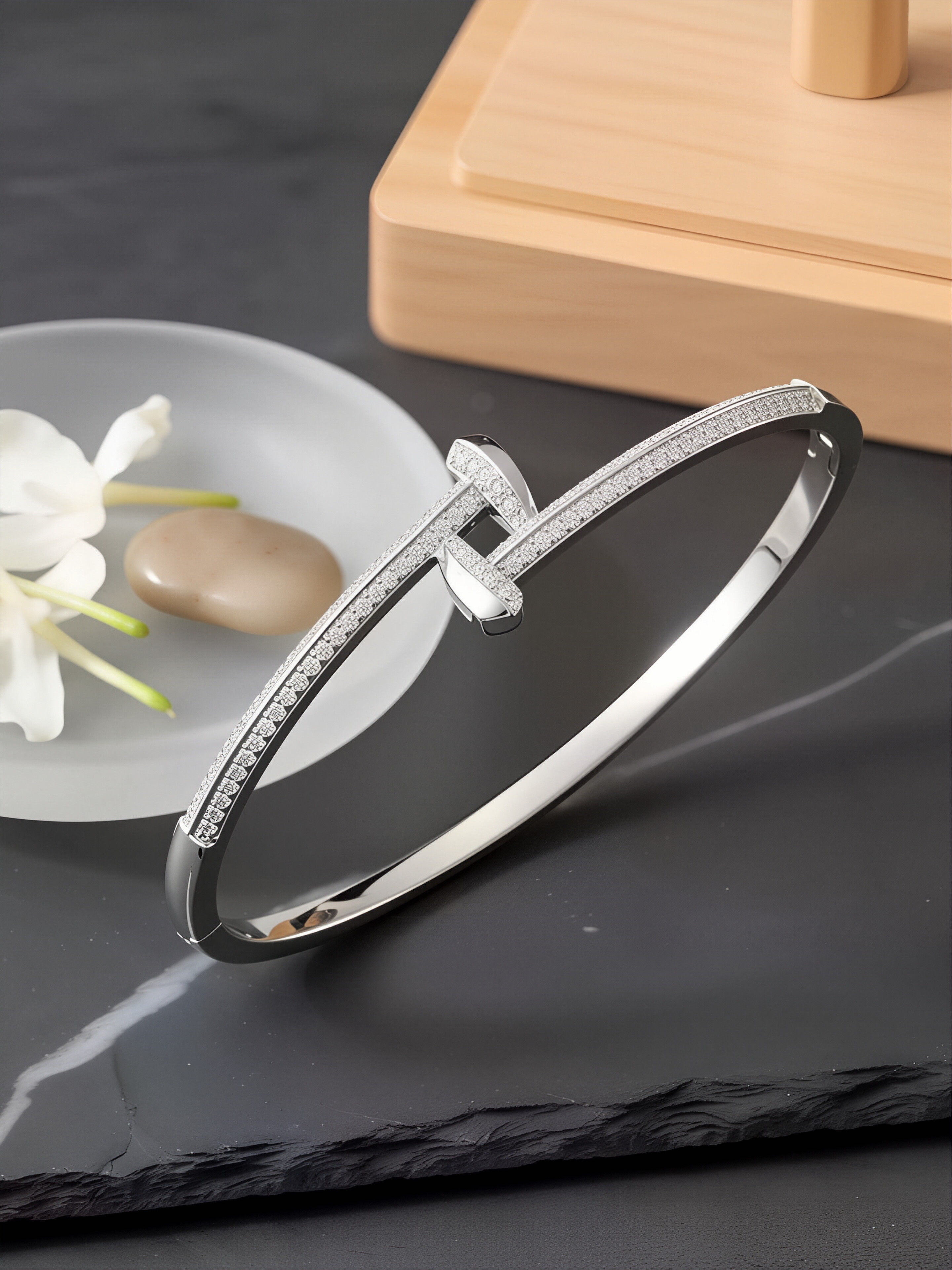 A silver stud-encrusted, ultra-shiny cubic zirconia womens bracelet, perfect for parties and dinners