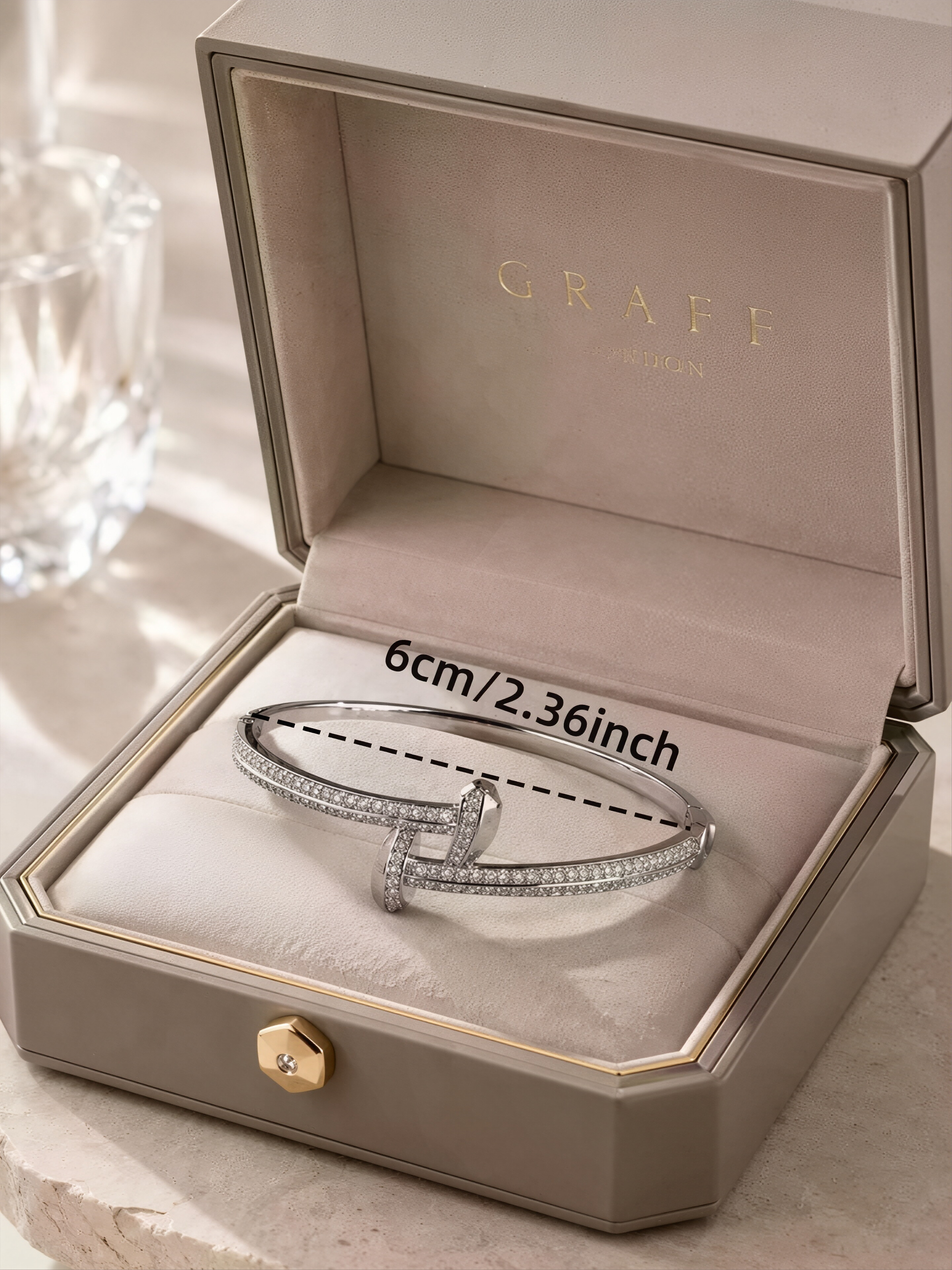 A silver stud-encrusted, ultra-shiny cubic zirconia womens bracelet, perfect for parties and dinners