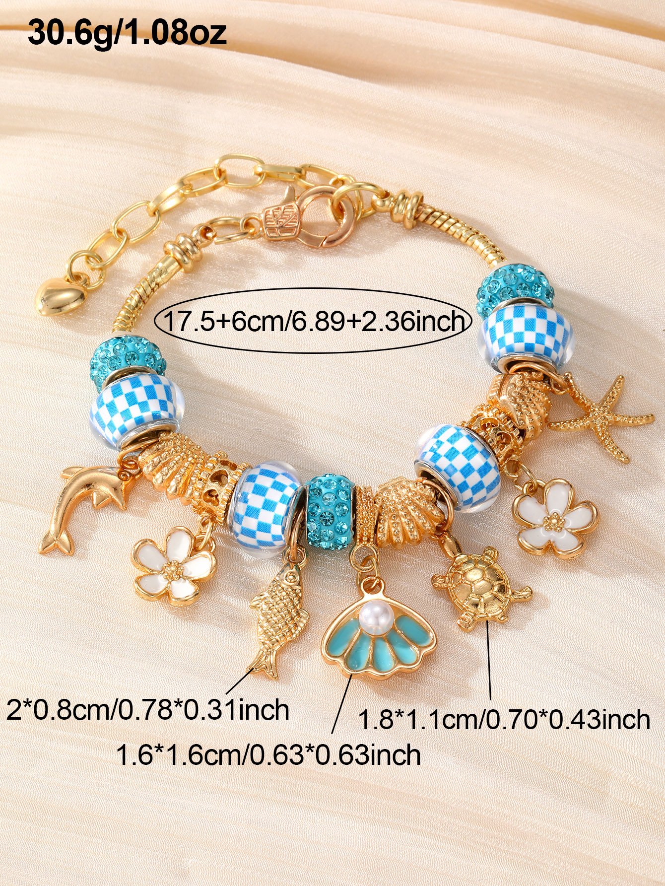 Gold-Plated Charm Bracelet with Nautical and Floral Accents