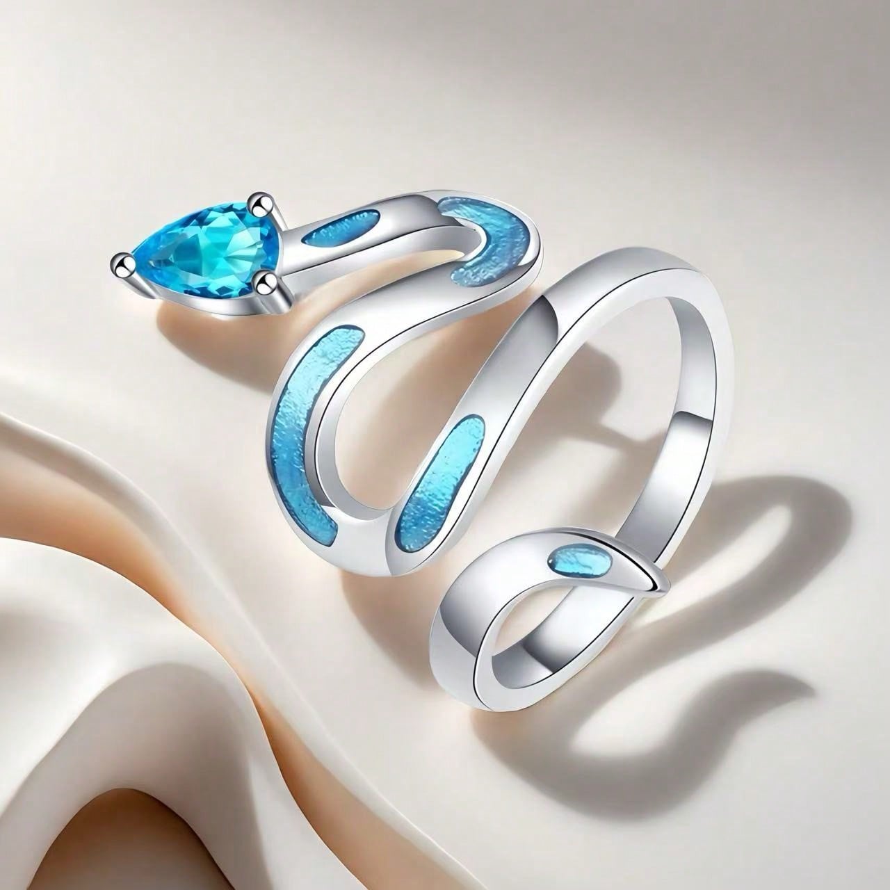 Fashion personality zircon shallow blue glue wrapped snake ring, open frost animal ring, suitable for friends to wear every day.
