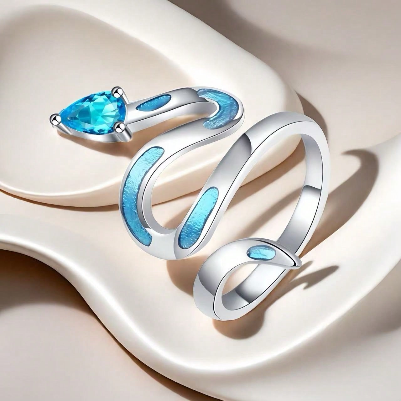 Fashion personality zircon shallow blue glue wrapped snake ring, open frost animal ring, suitable for friends to wear every day.