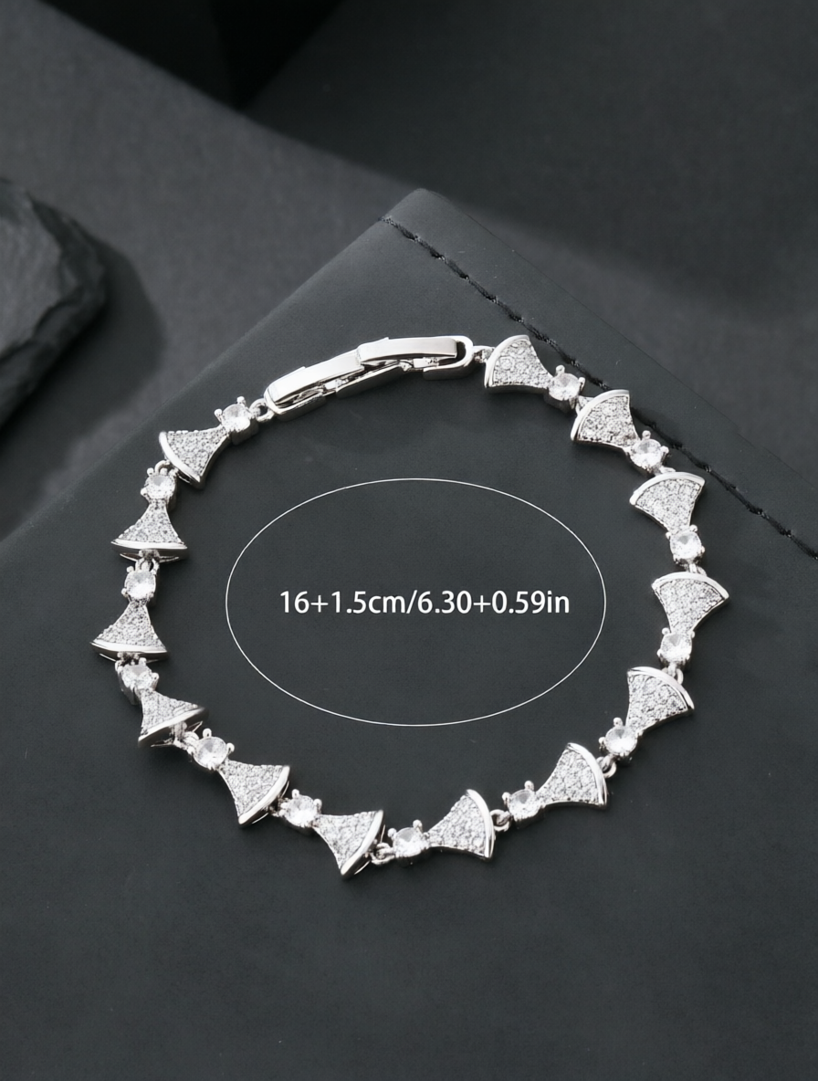 Silver fan-shaped bracelet set with ultra-shiny cubic zirconia, perfect for parties and dinners