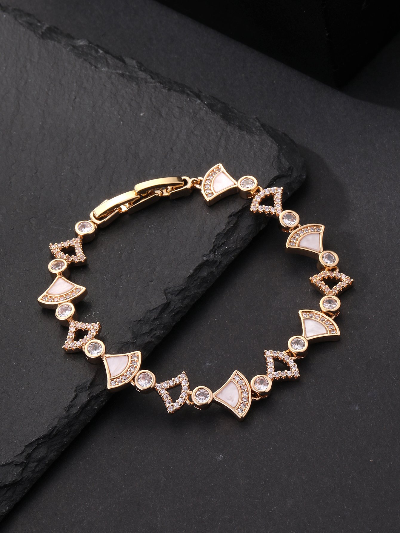 Gold fan-shaped shell-encrusted ultra-shiny cubic zirconia womens bracelet, perfect for parties and dinners