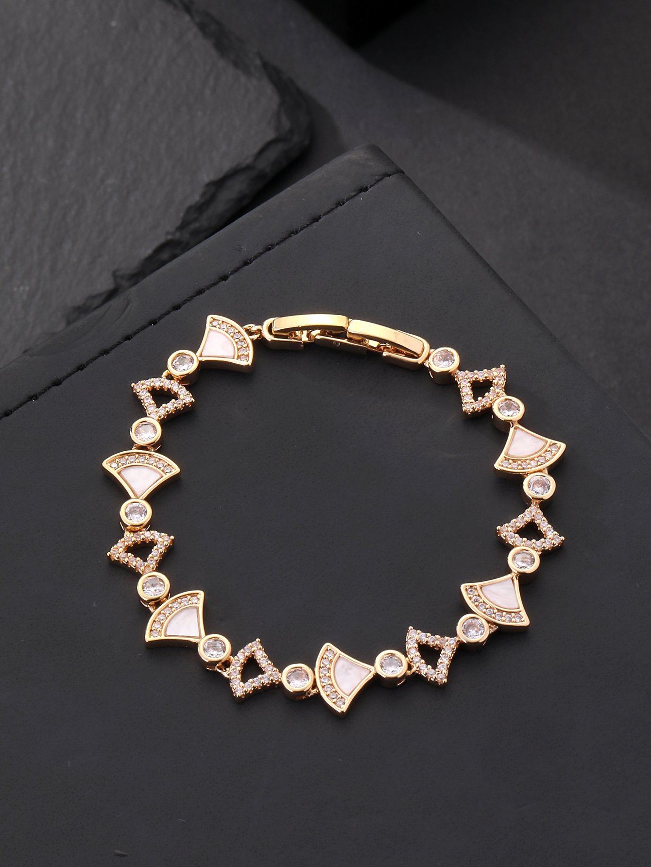 Gold fan-shaped shell-encrusted ultra-shiny cubic zirconia womens bracelet, perfect for parties and dinners