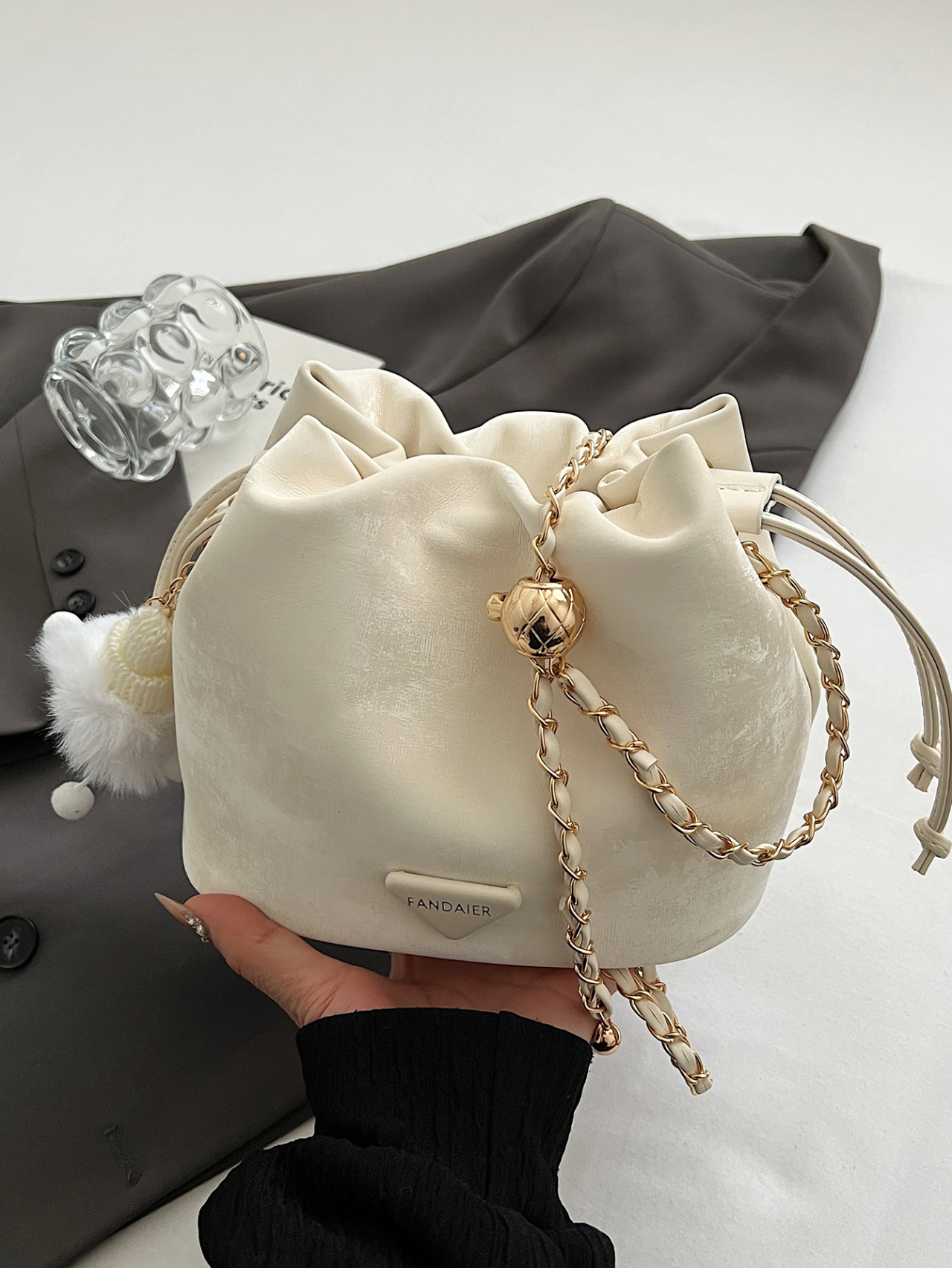 White Drawstring Crossbody Bag with Chain Detail