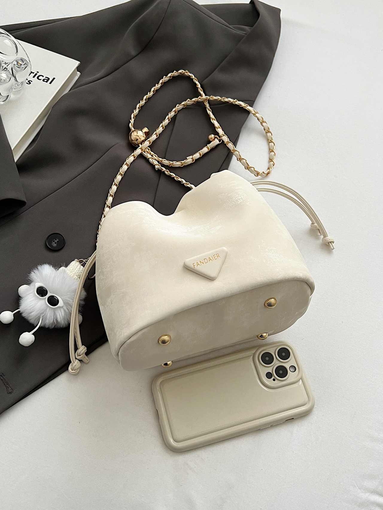 White Drawstring Crossbody Bag with Chain Detail