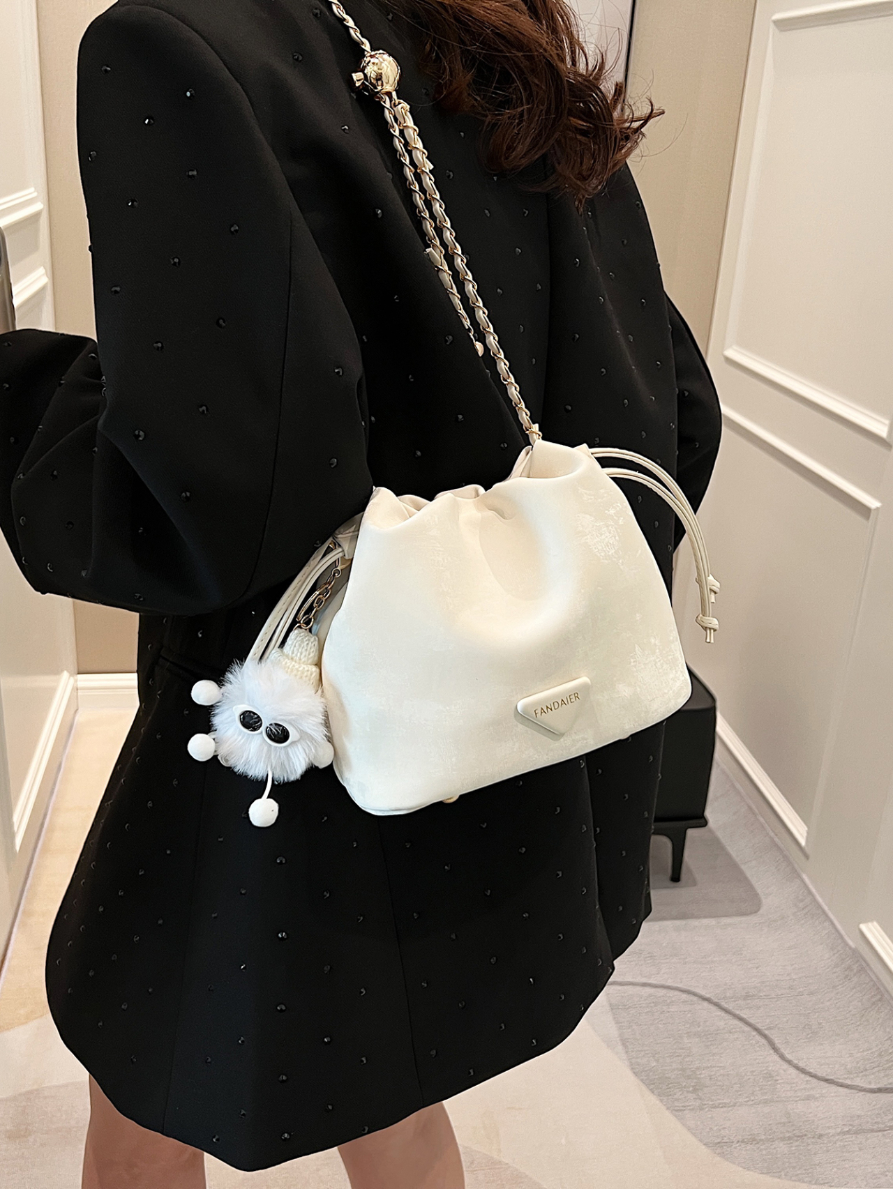 White Drawstring Crossbody Bag with Chain Detail