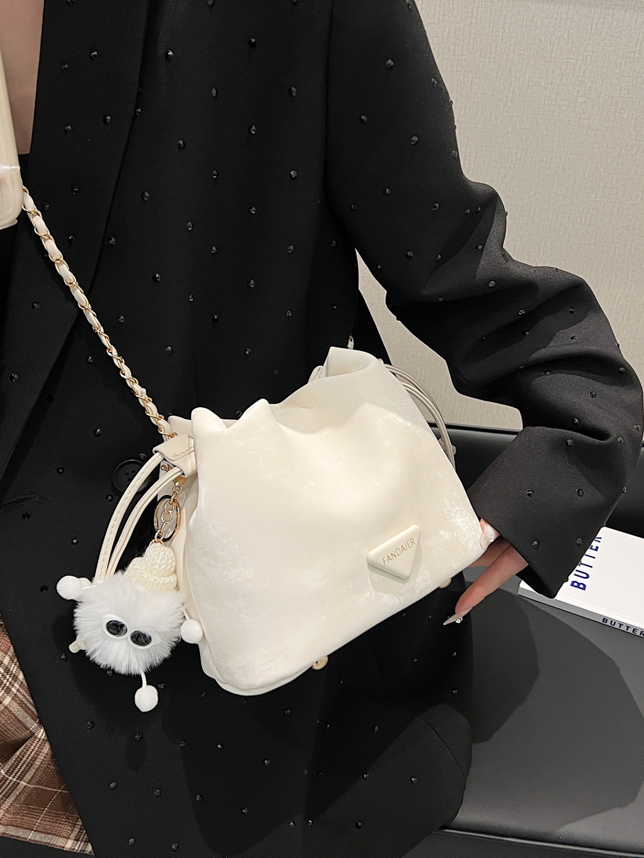 White Drawstring Crossbody Bag with Chain Detail