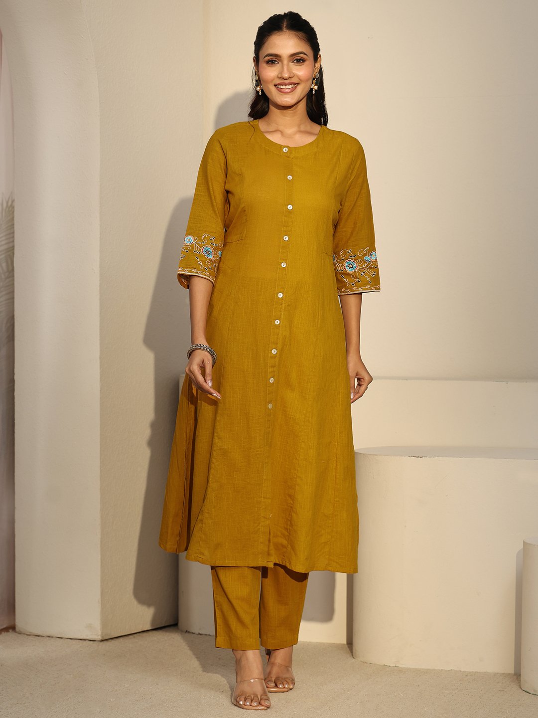 Mustard Solid Cotton Kurta Set with Embroidered Sleeves