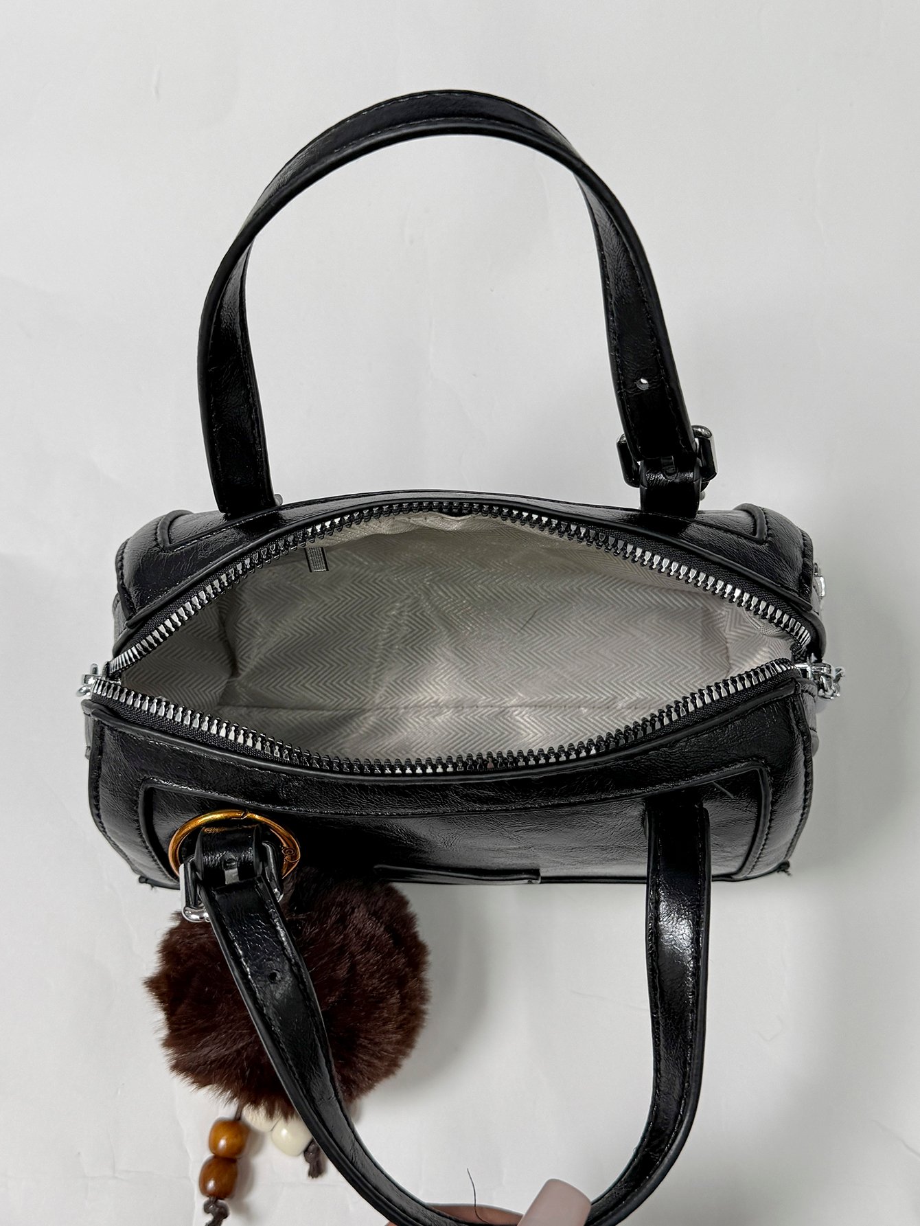 A womens handbag and crossbody bag