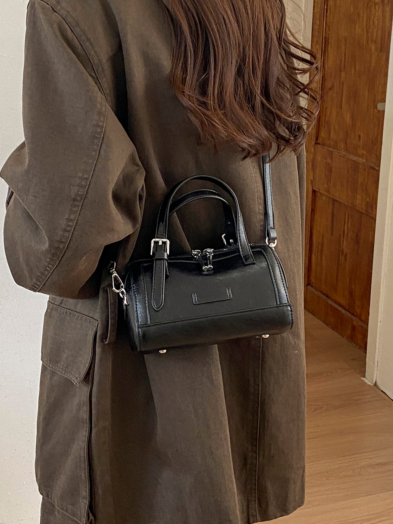 A womens handbag and crossbody bag