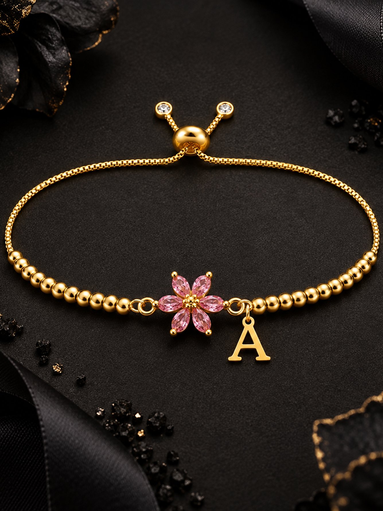 Golden Beaded Bracelet with Pink Flower and Initial Charm