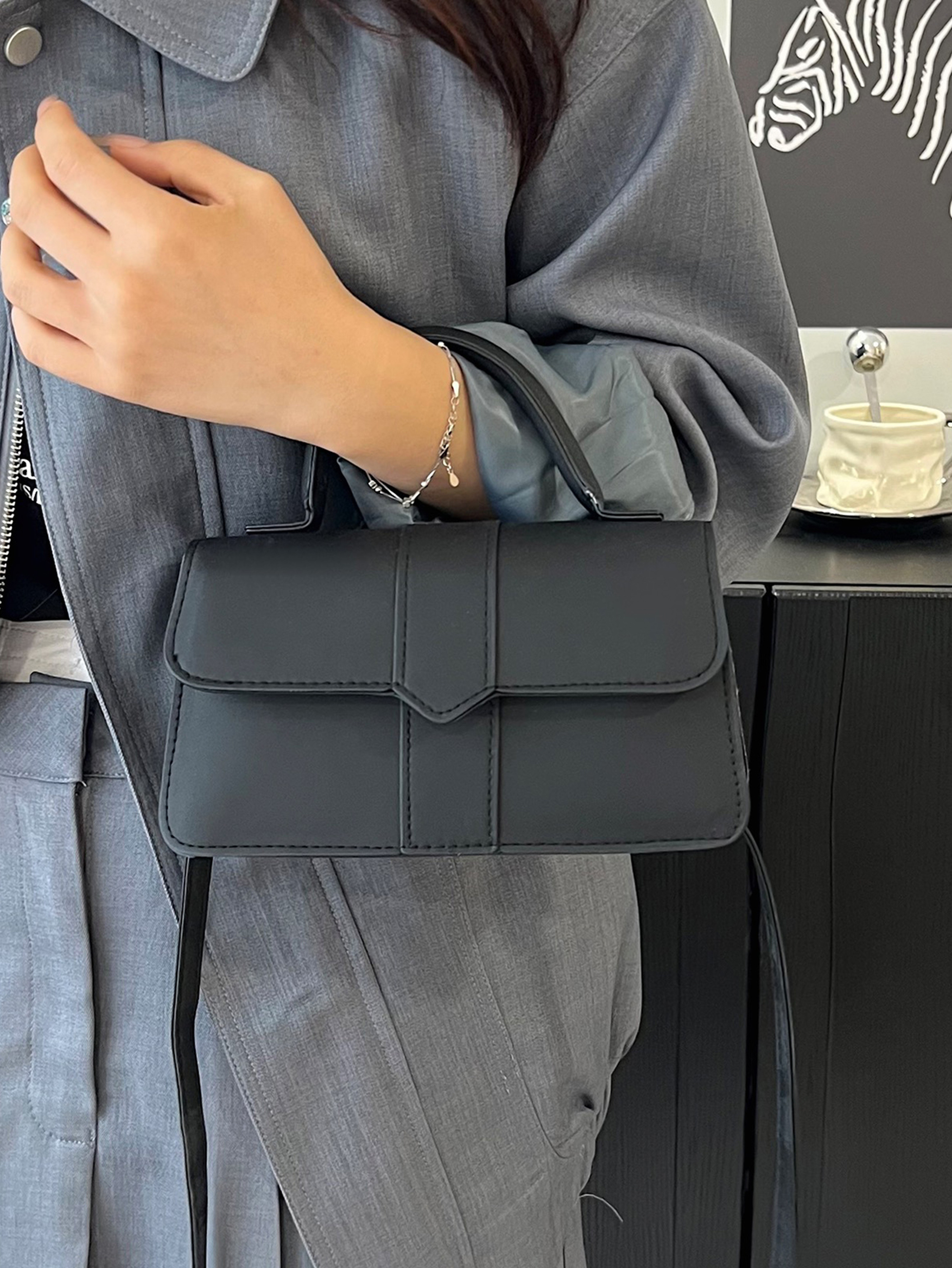 Black Handbag with Flap Closure