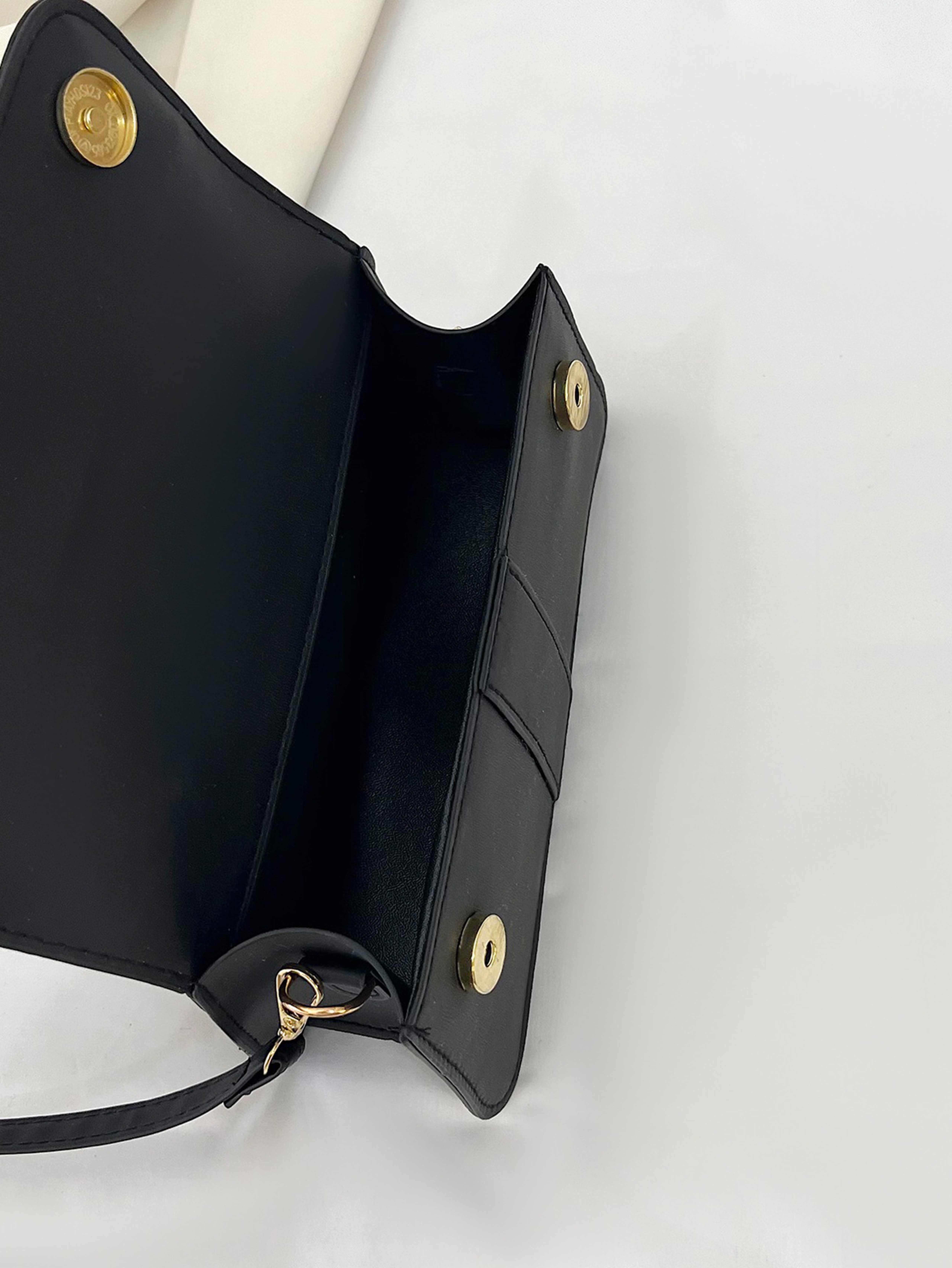 Black Handbag with Flap Closure