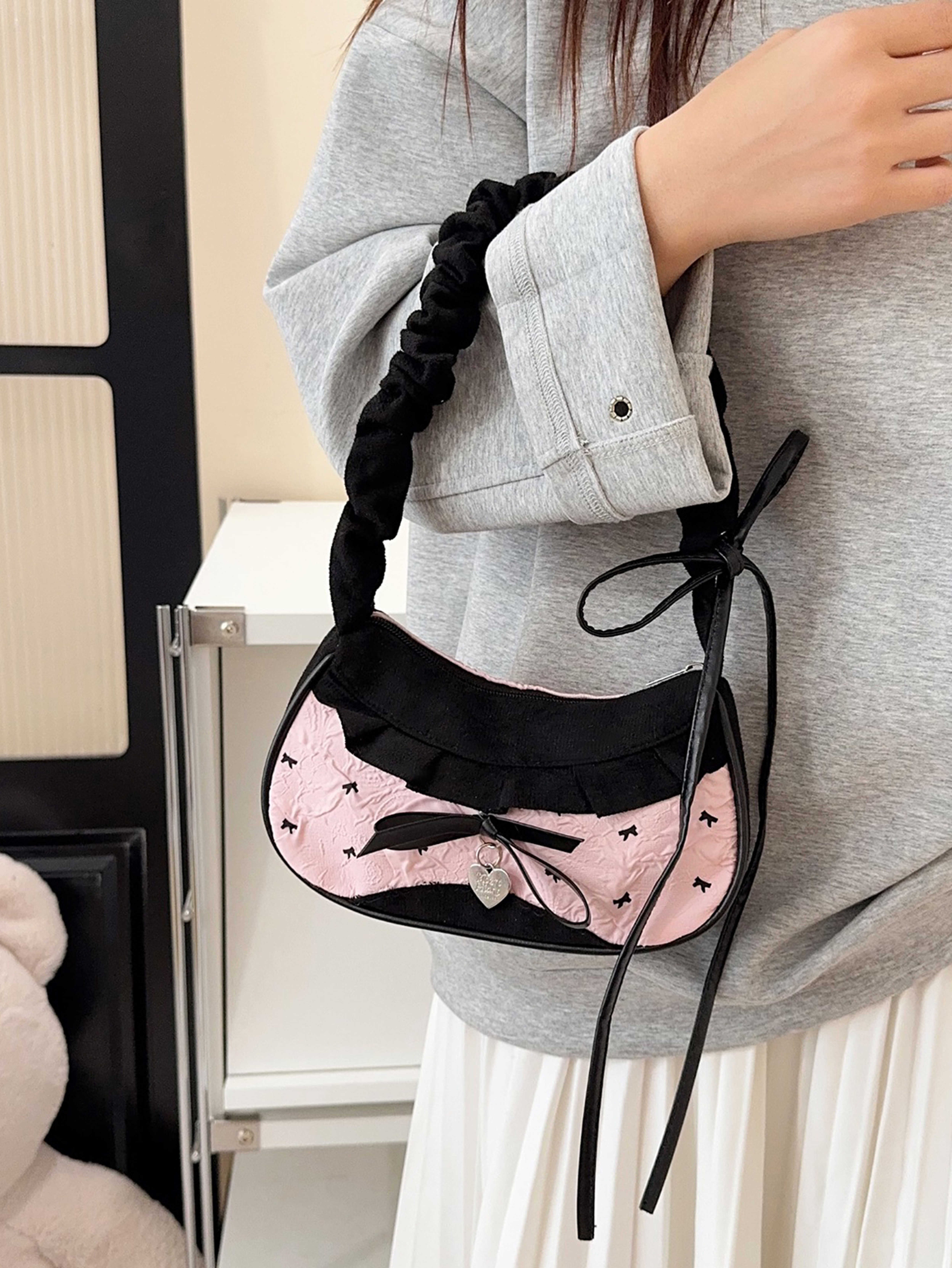Black and Pink Shoulder Bag with Zip Closure