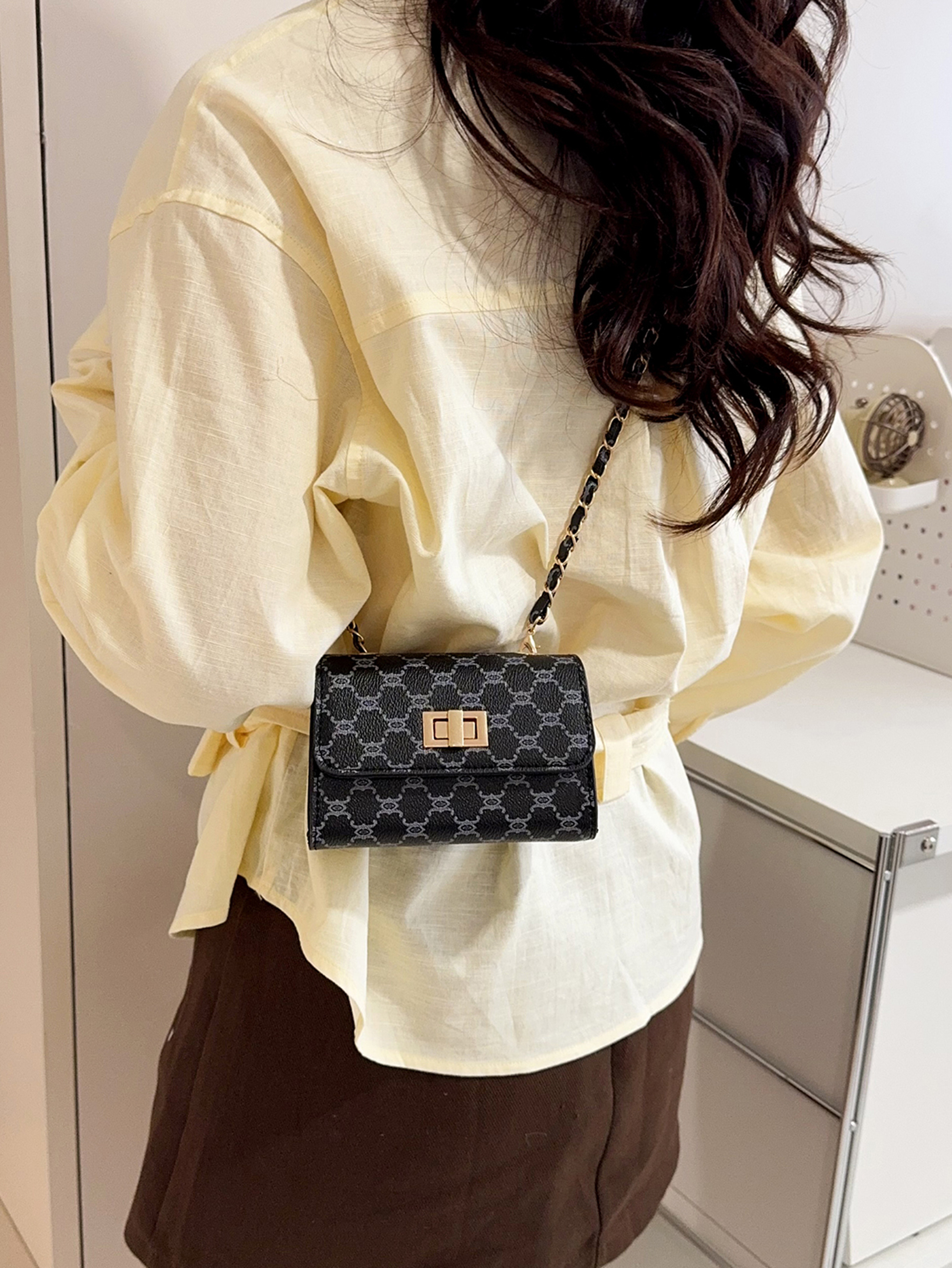 Black Crossbody Bag with Push Lock Closure