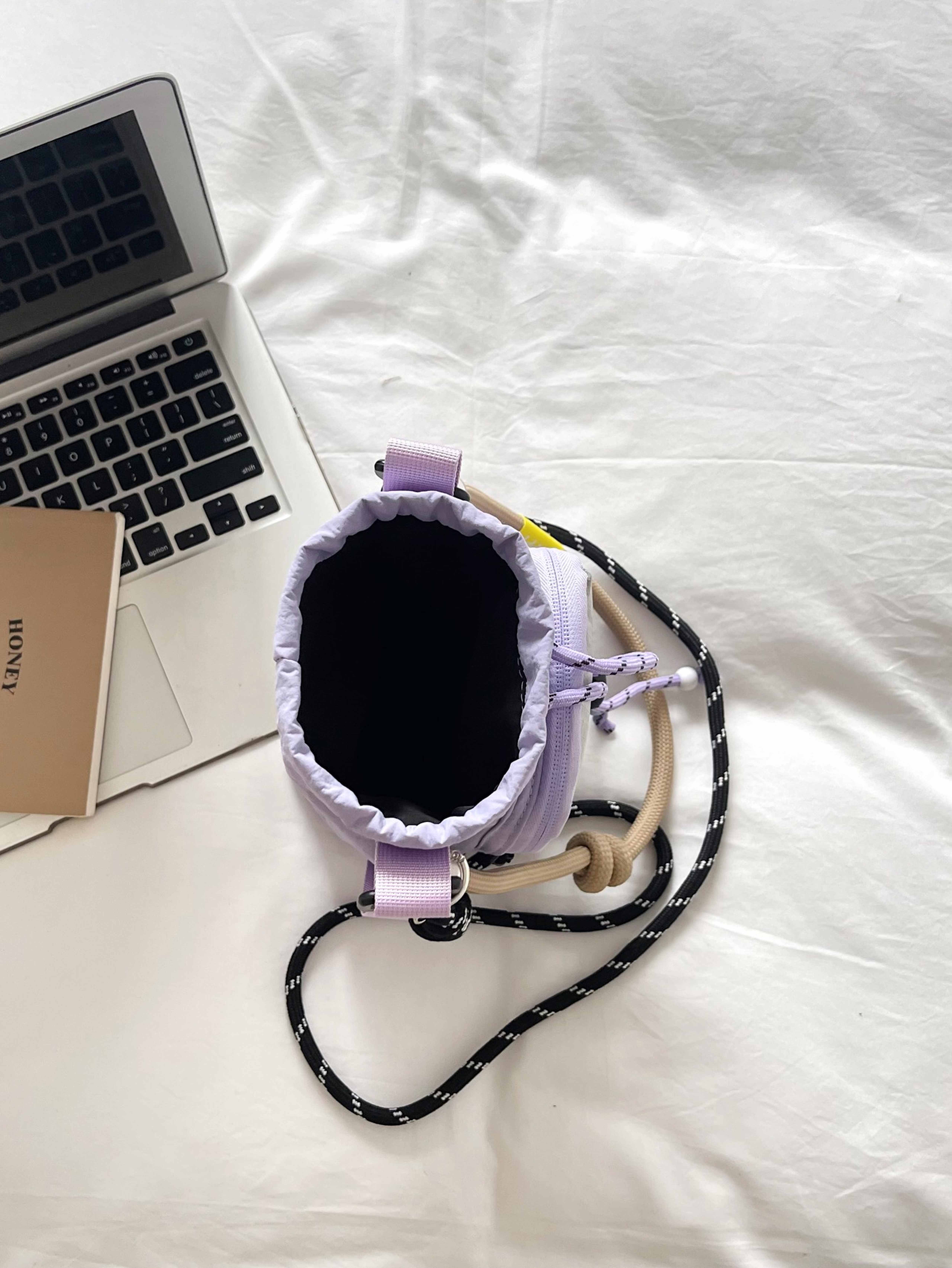 Purple Grid-Panel Drawstring Shoulder Bag