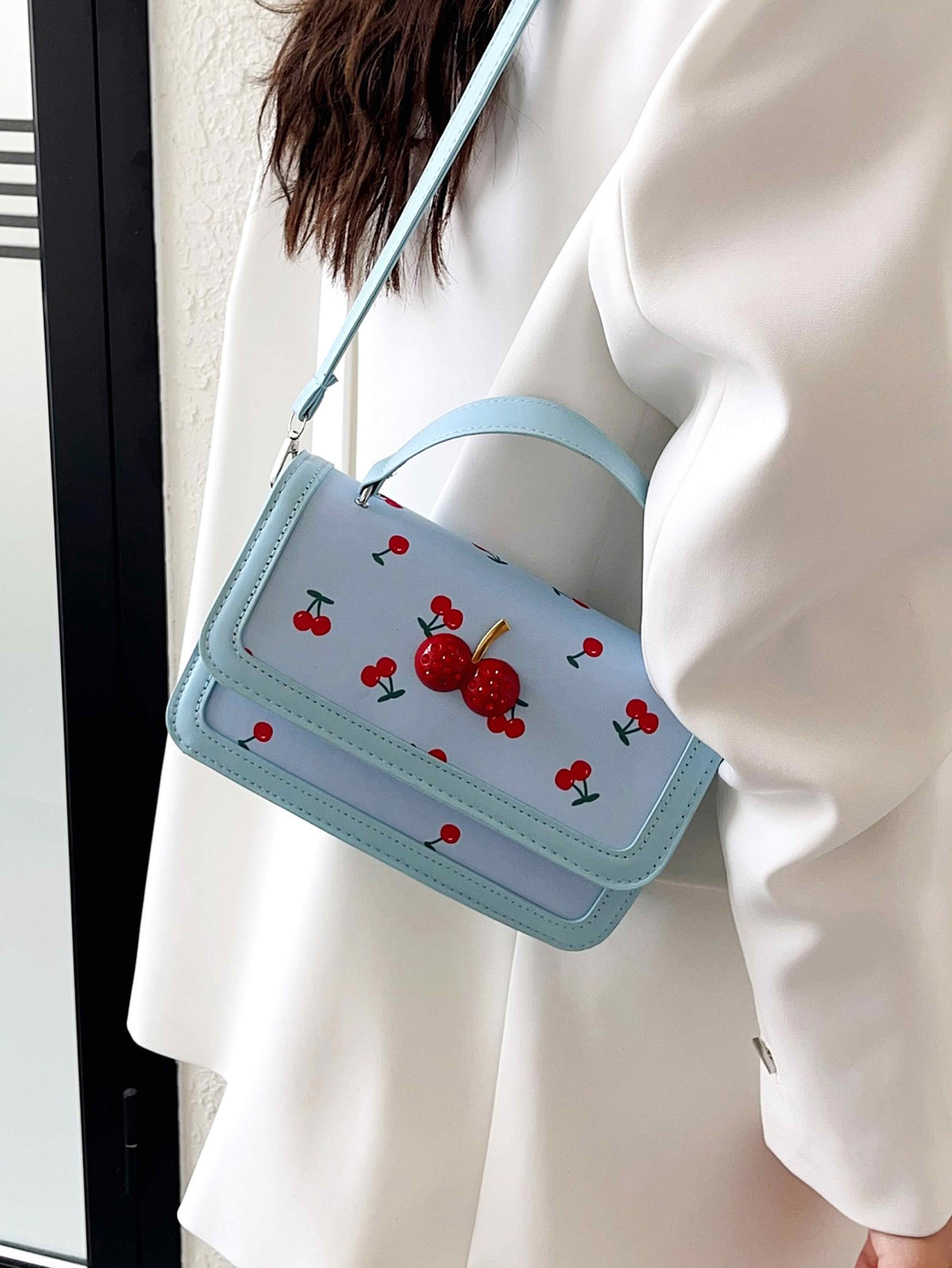 Light Blue Crossbody Bag with Button Closure
