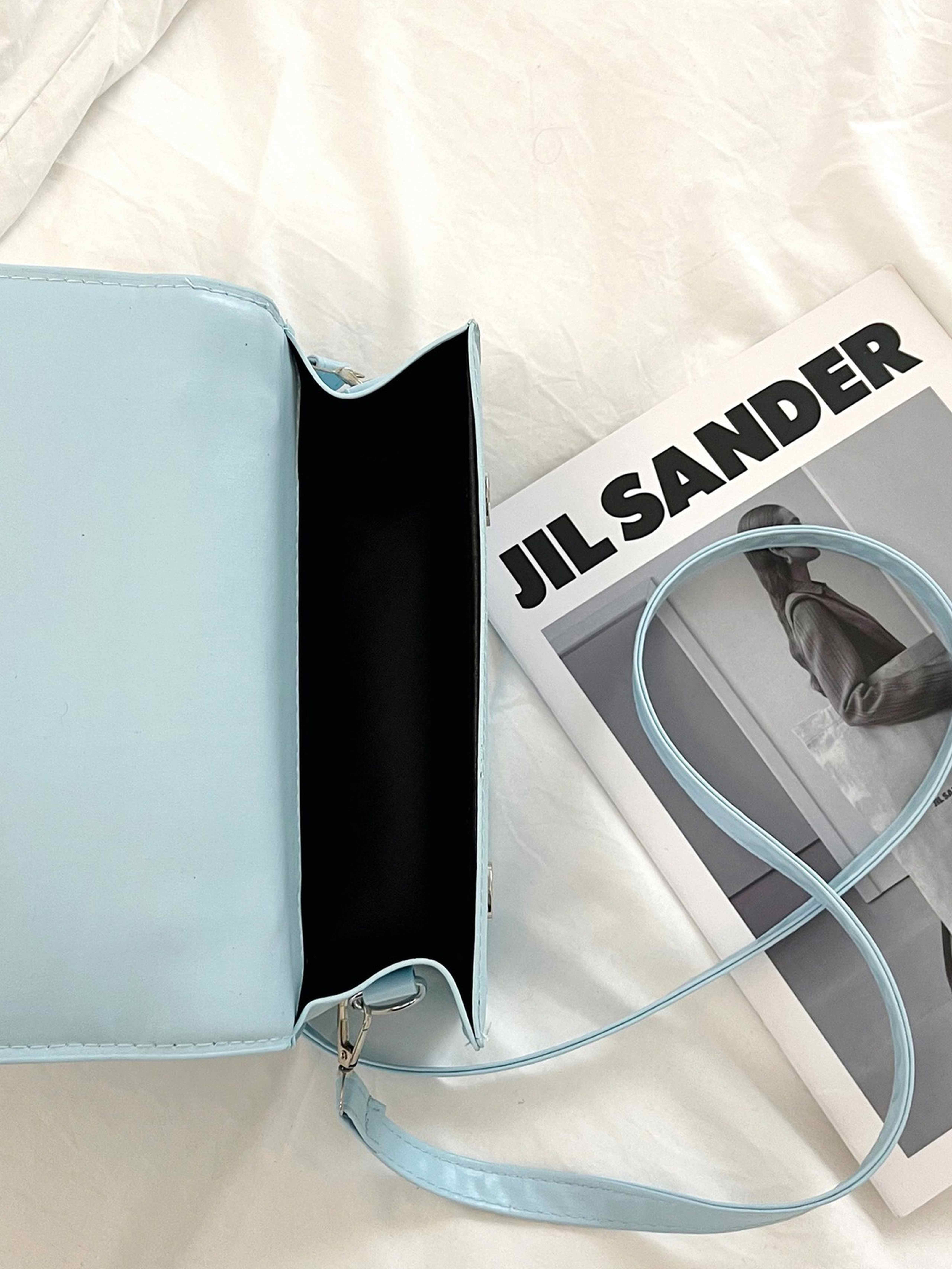 Light Blue Crossbody Bag with Button Closure